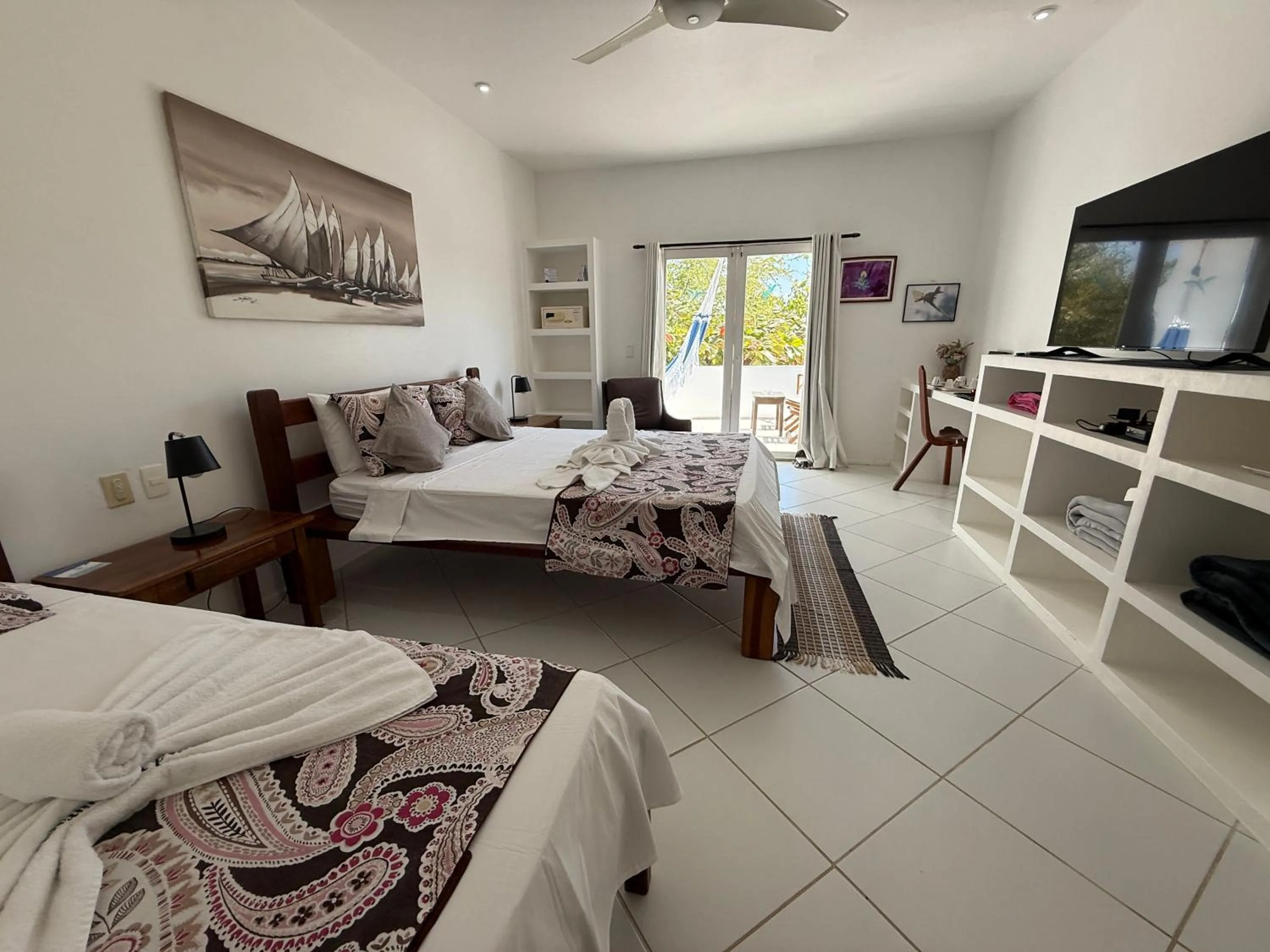 Bed in Pousada Caminho da Praia