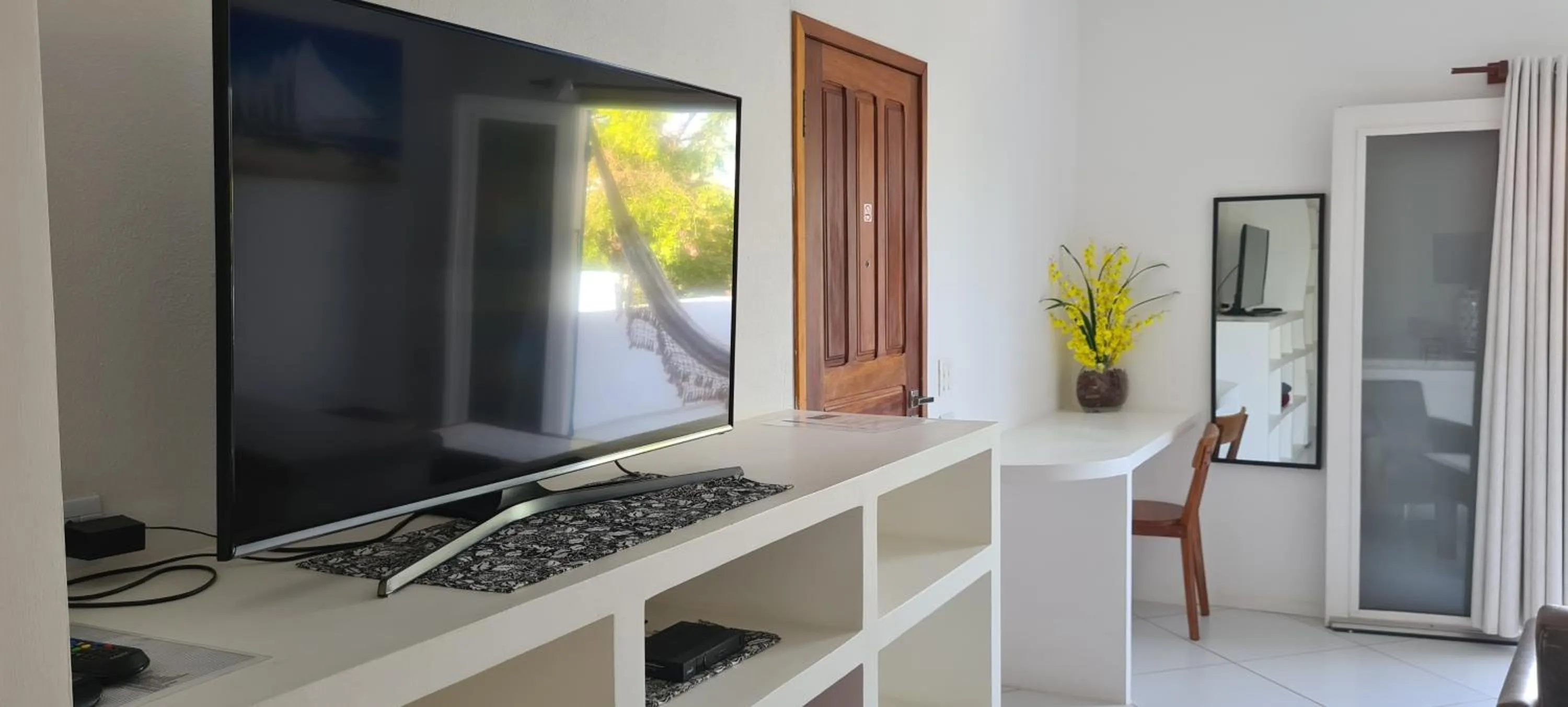 TV and multimedia in Pousada Caminho da Praia