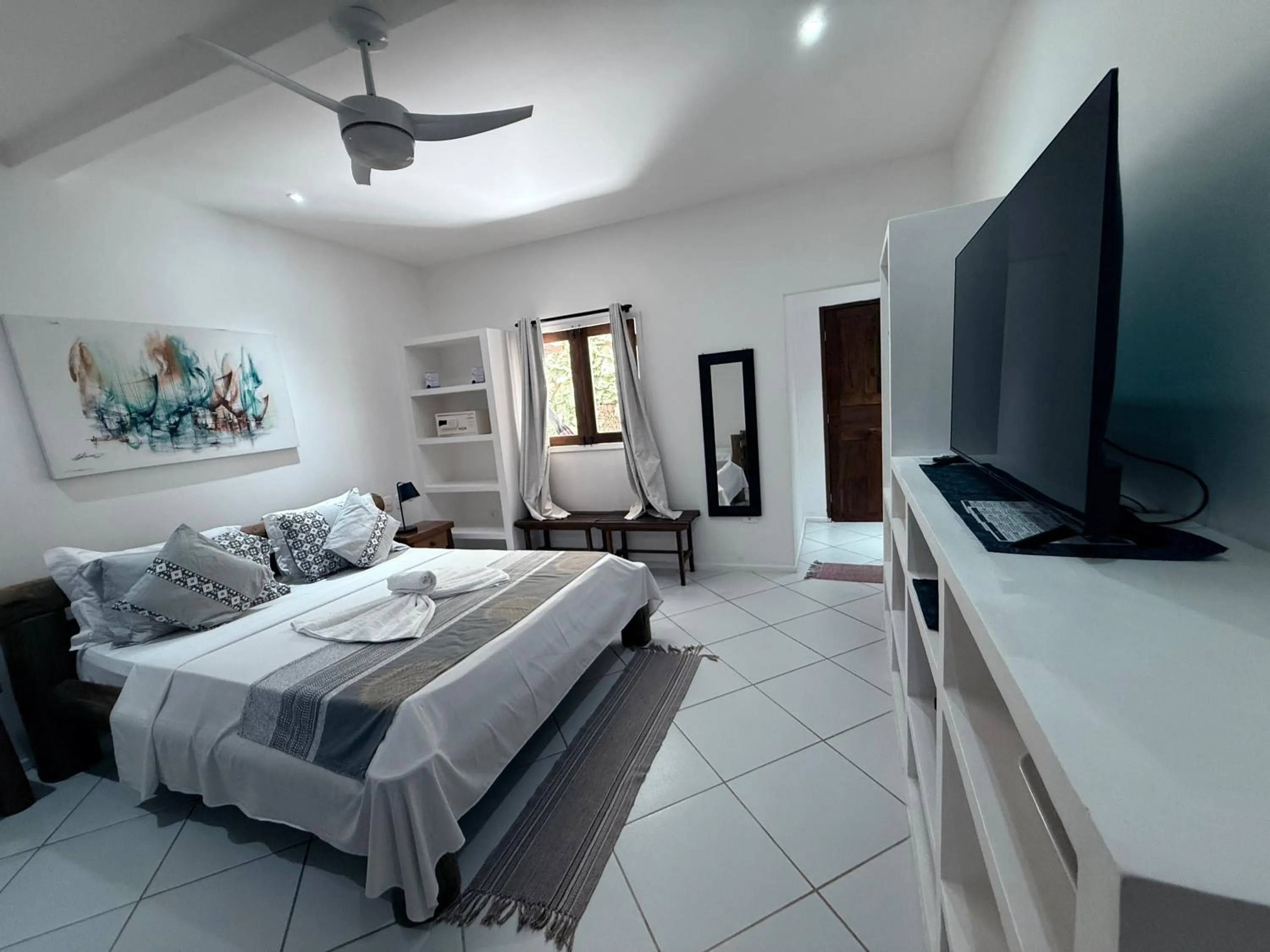 Bed in Pousada Caminho da Praia