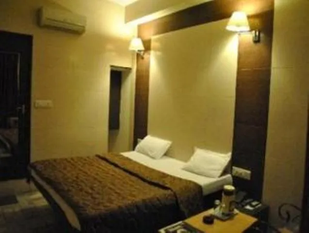 Bed in Hotel Golden Deluxe