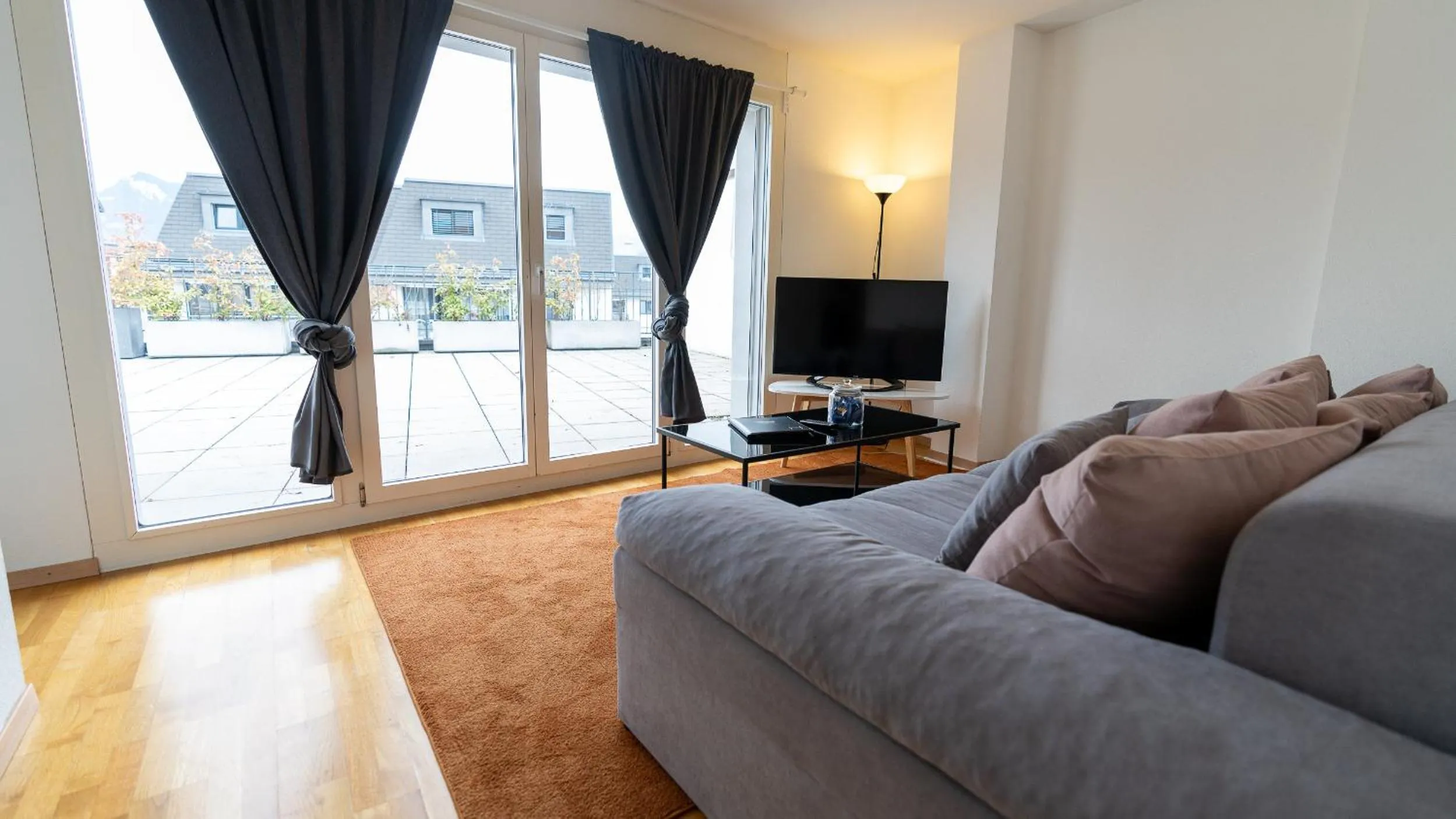 Communal lounge/ TV room in Los Lorentes Residences Bulle