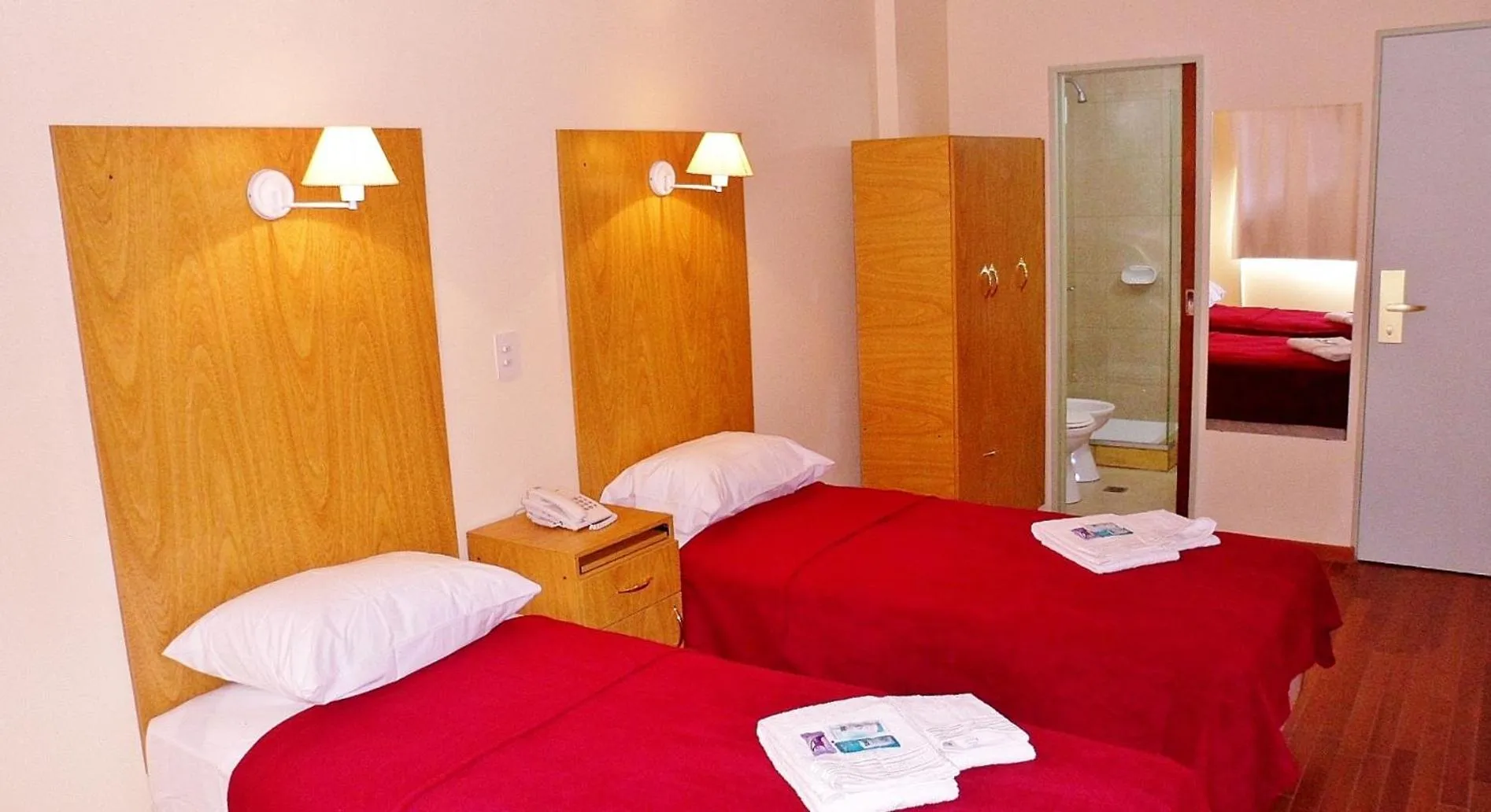 Photo of the whole room, Bed in Hotel Juramento