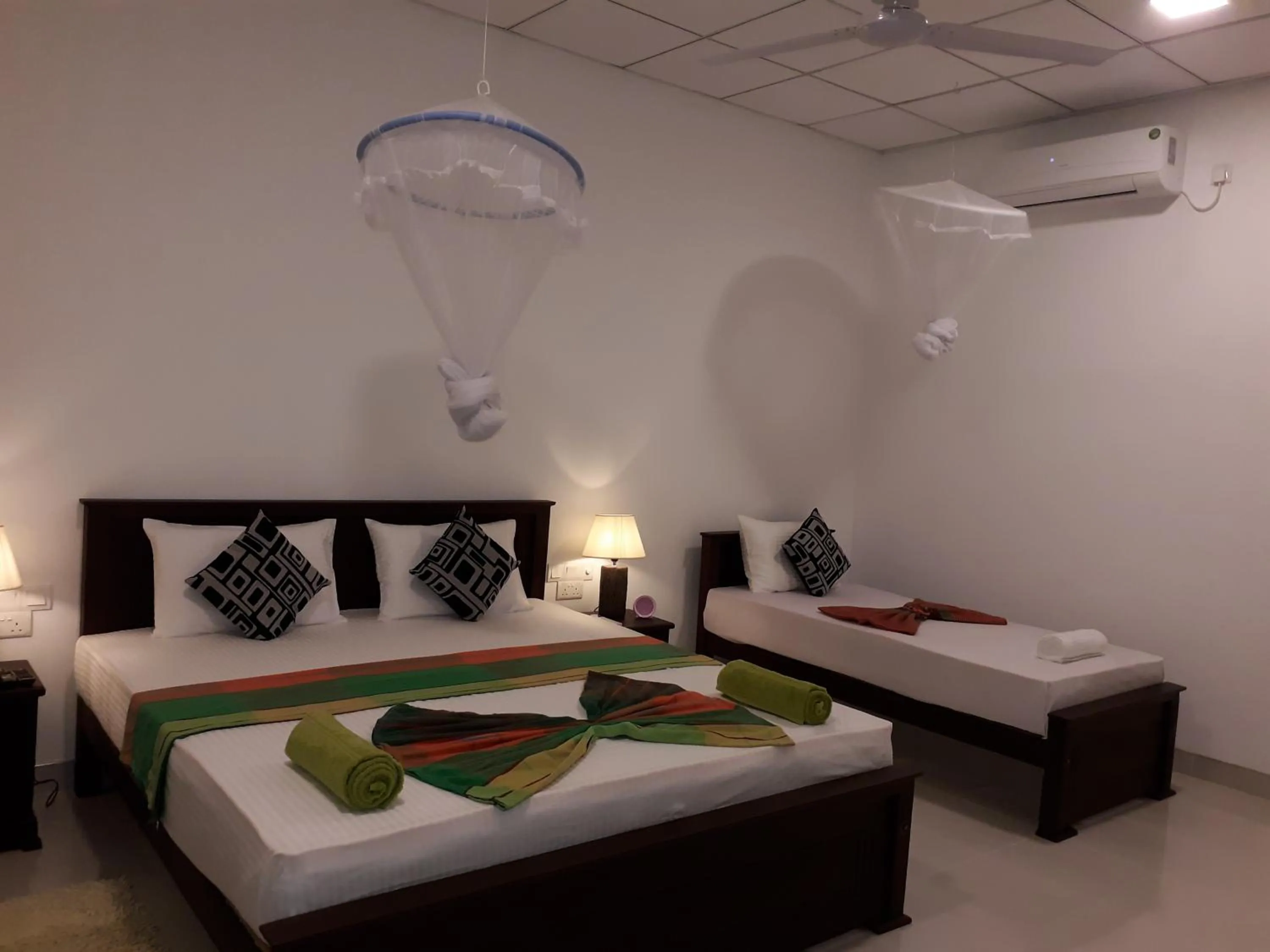 Bed in Sigiri Hibiscus Villa