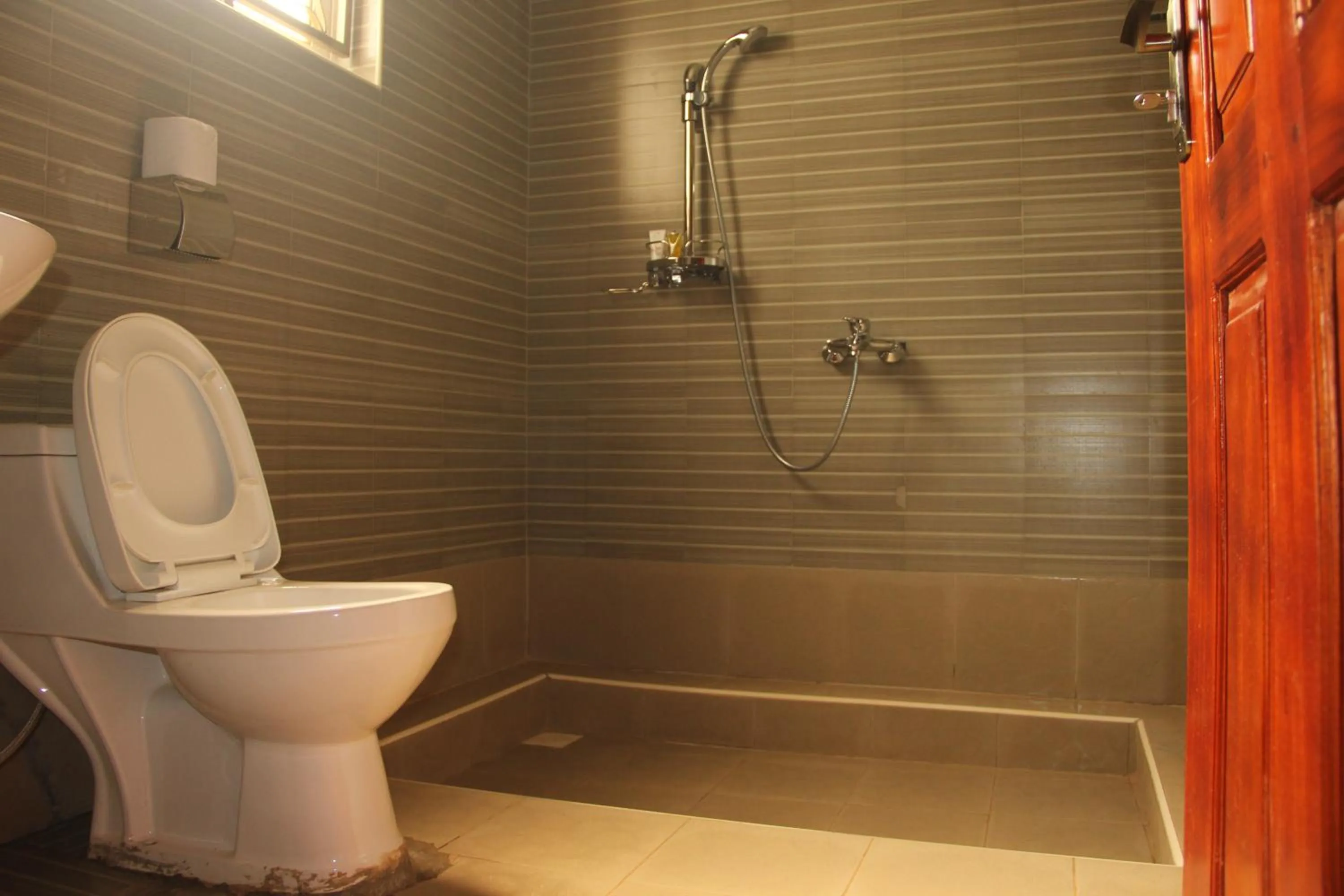 Shower in Saltek Forest Cottages