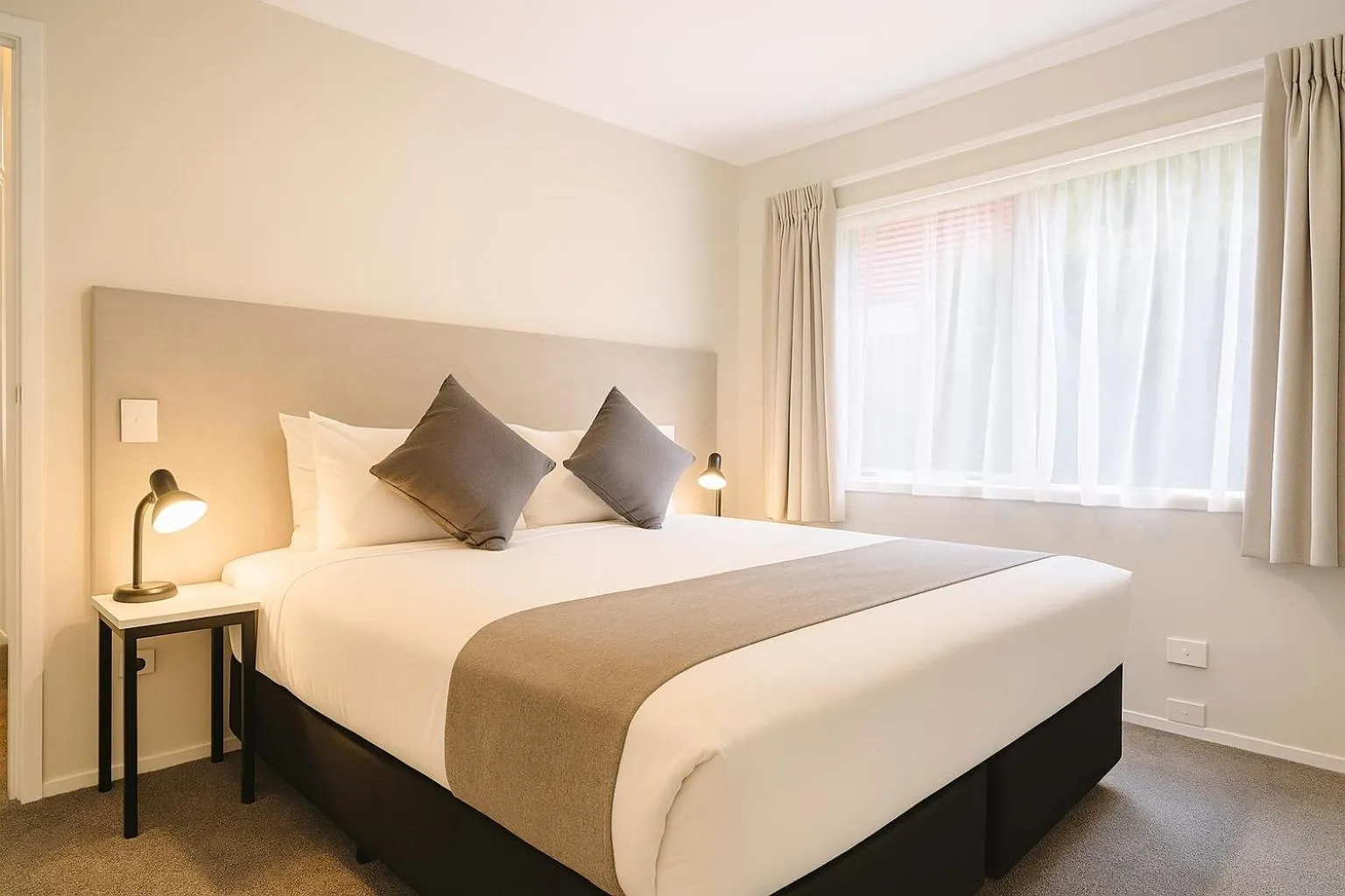 Bed in BKs Pioneer Motel