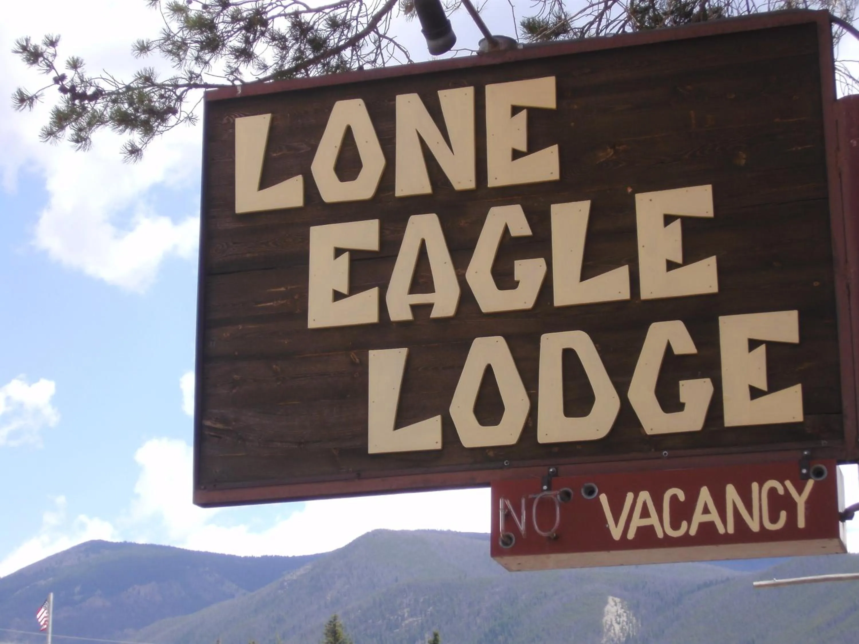 Property logo or sign in Lone Eagle Lodge