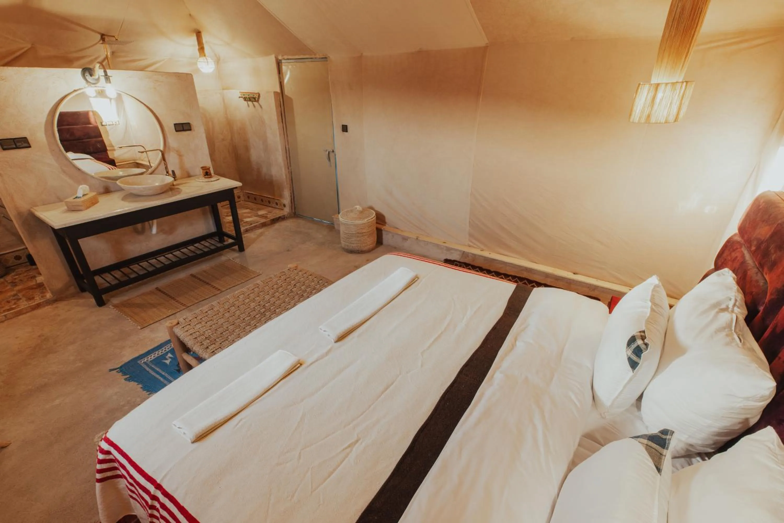 Bed in Tassili Luxury Desert Camp