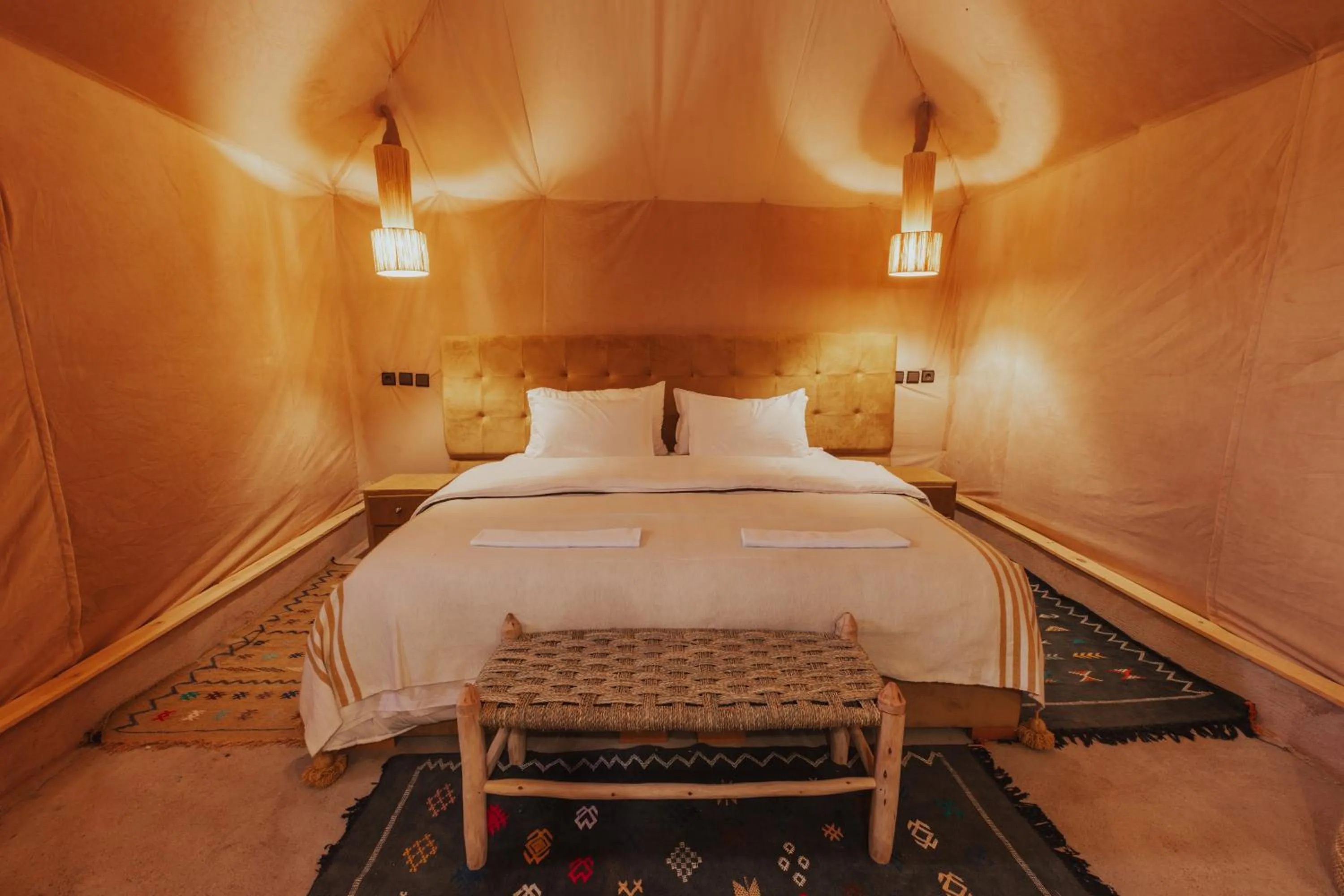 Bed in Tassili Luxury Desert Camp