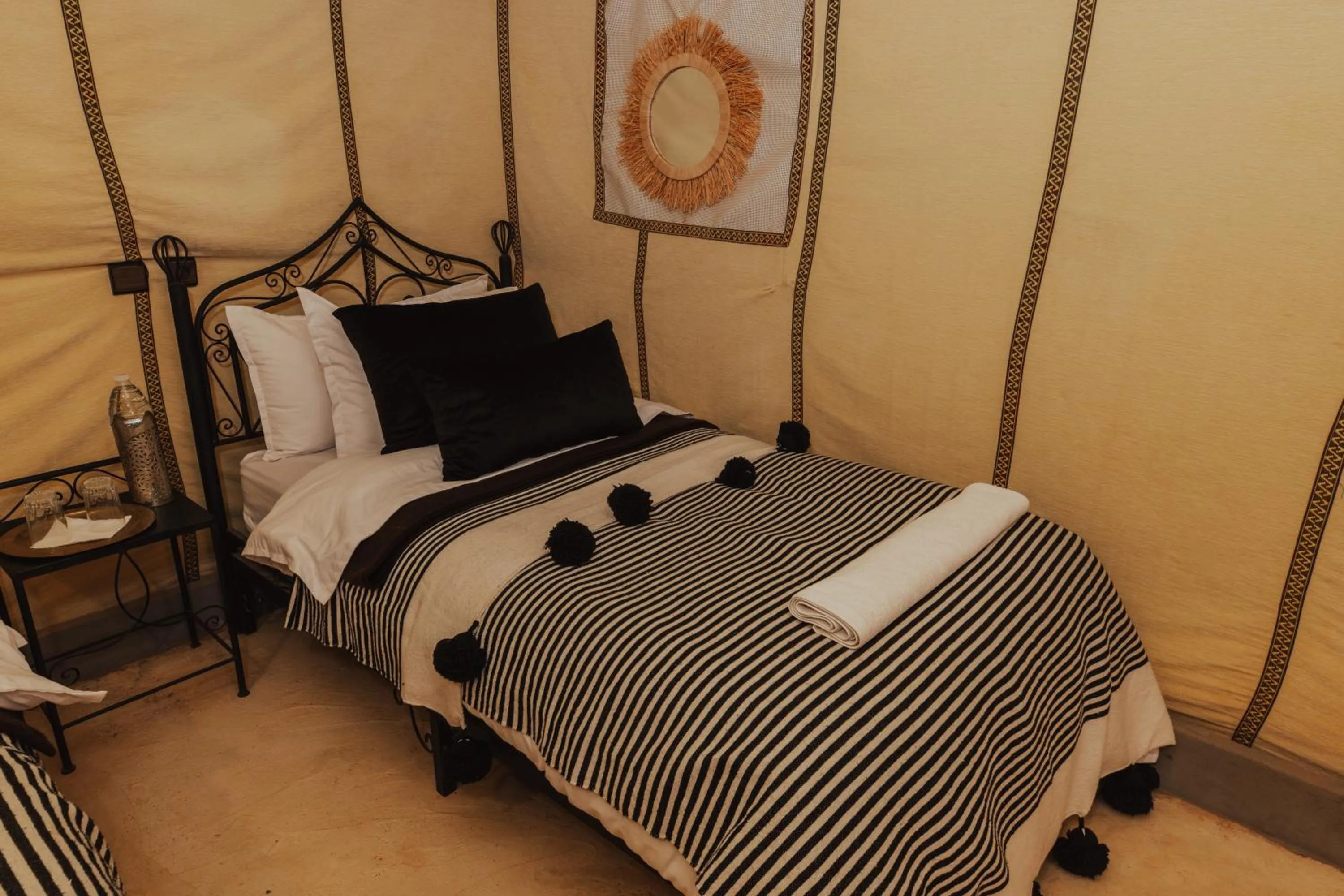 Bed in Tassili Luxury Desert Camp