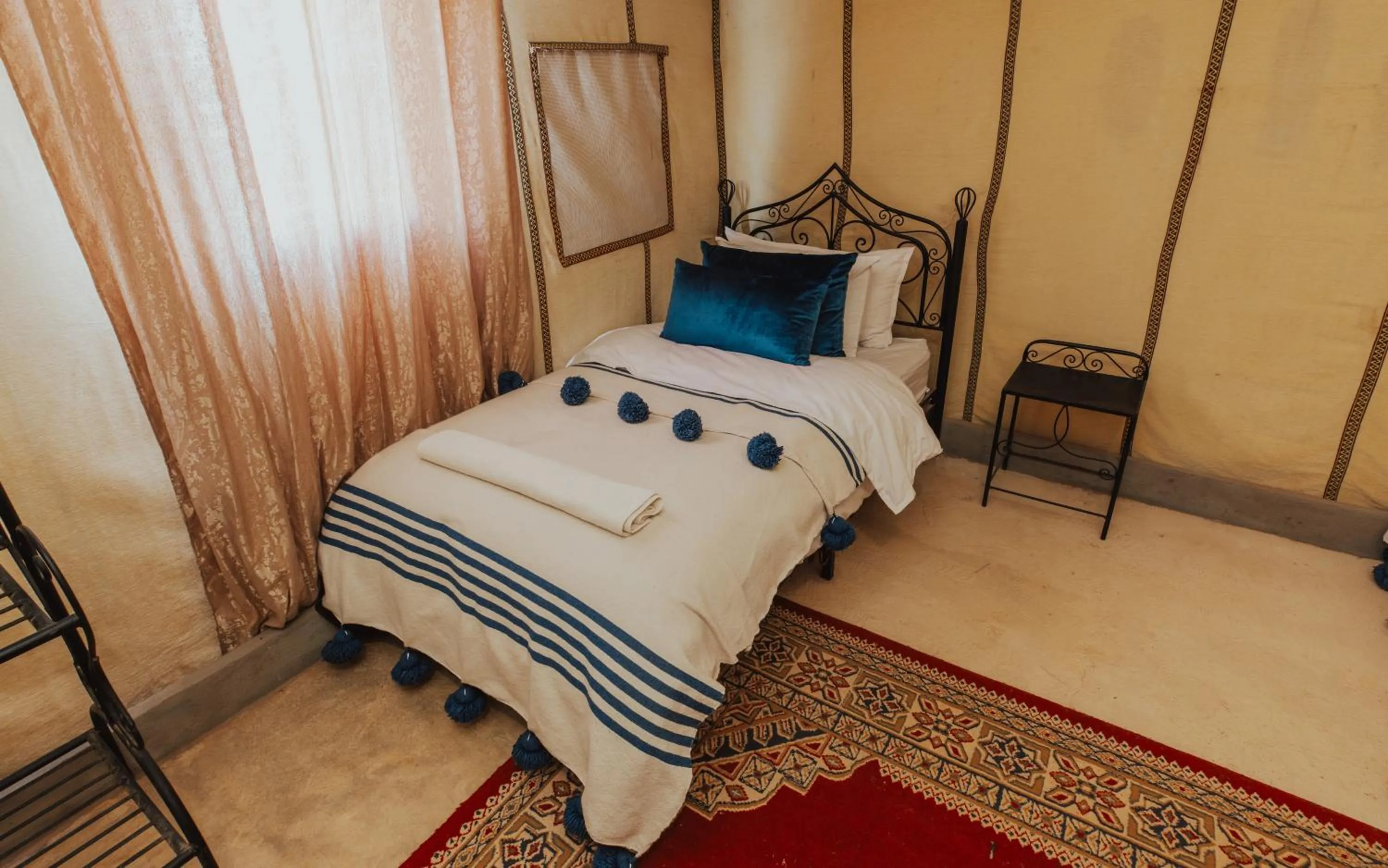 Bed in Tassili Luxury Desert Camp