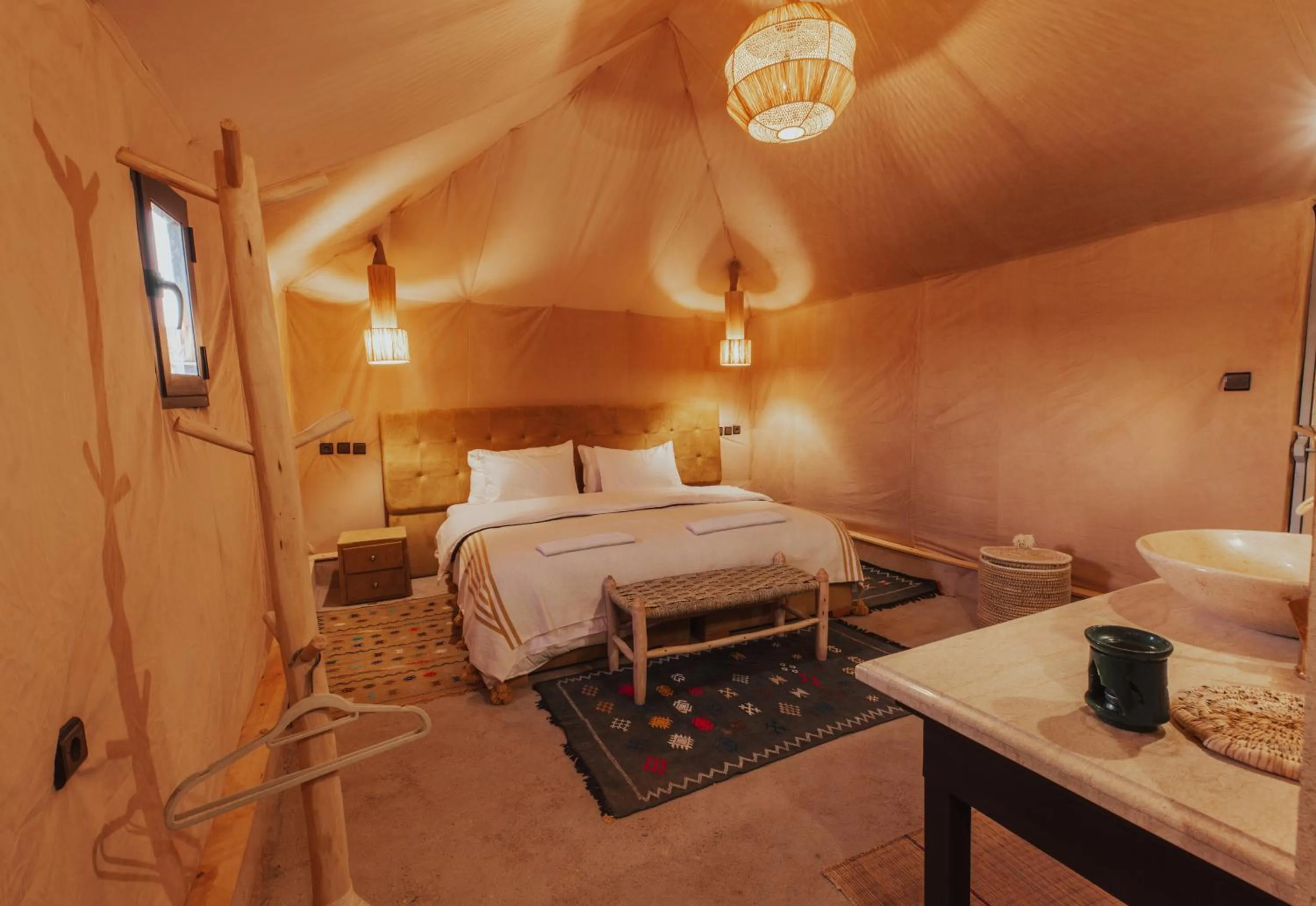Bed in Tassili Luxury Desert Camp
