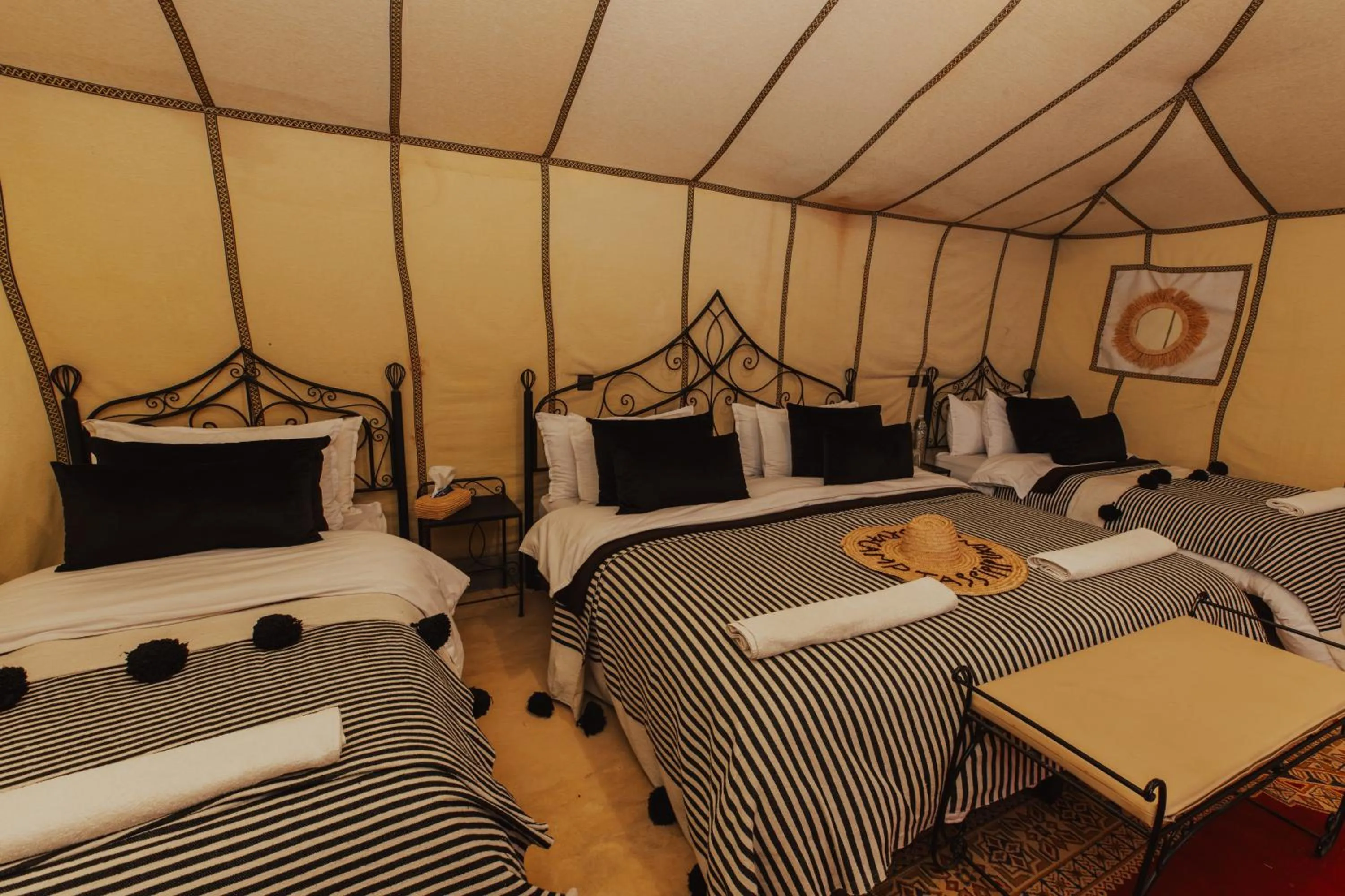 Bed in Tassili Luxury Desert Camp
