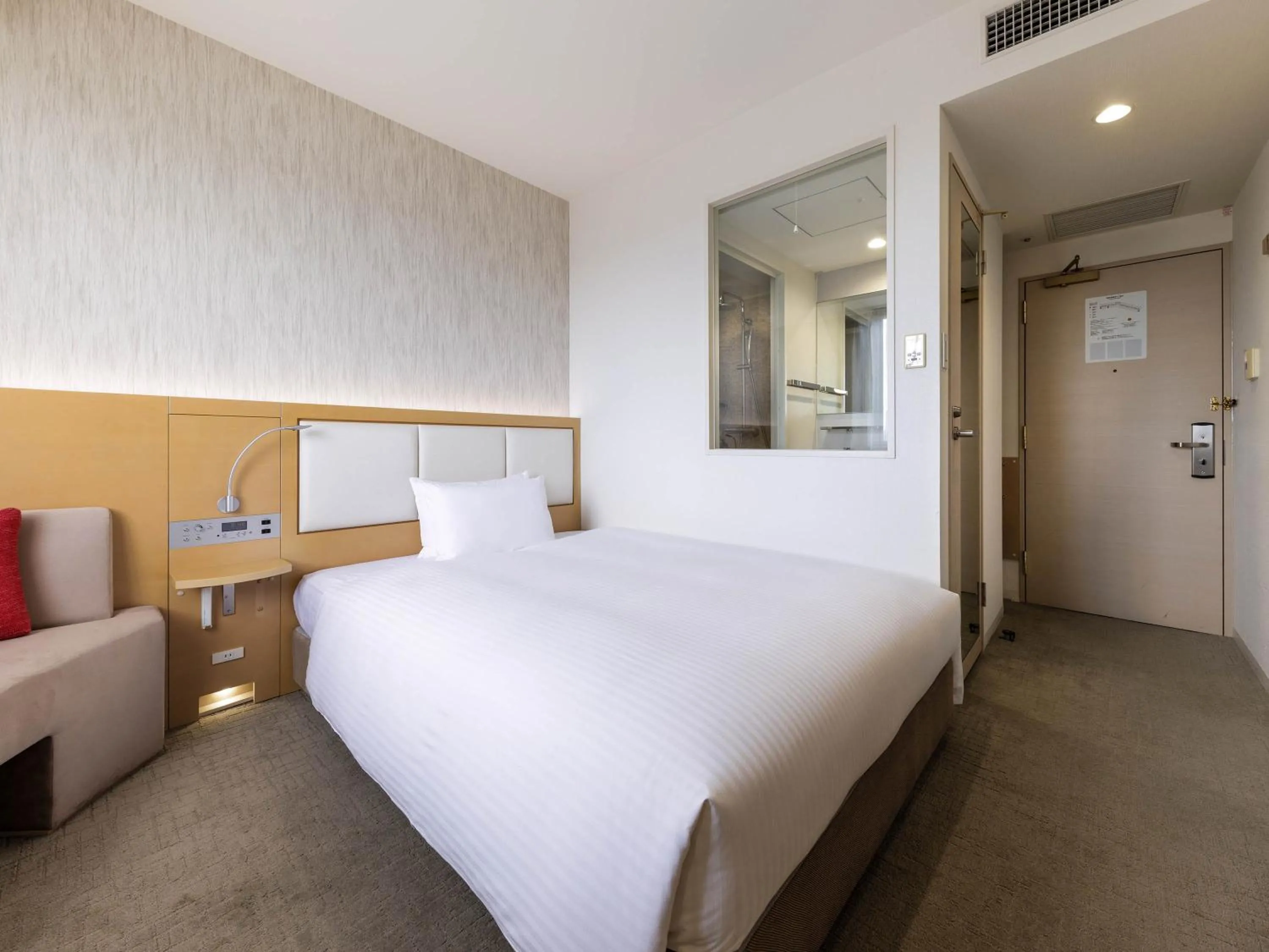 Bed in Nishitetsu Hotel Croom Hakata