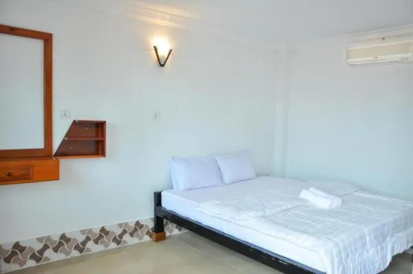 Photo of the whole room, Bed in Silver Dolphin Guesthouse & Restaurant