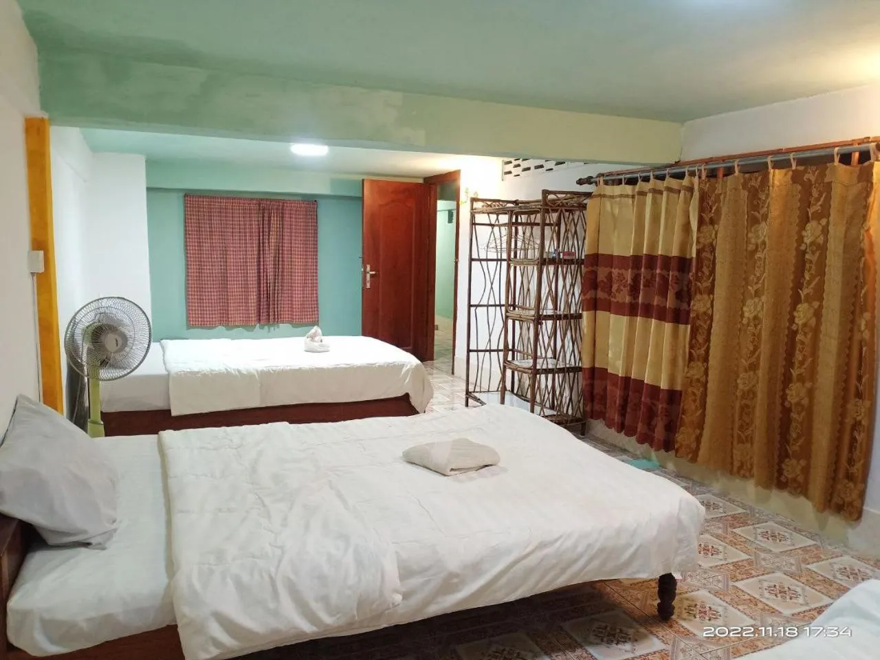 Photo of the whole room, Bed in Silver Dolphin Guesthouse & Restaurant