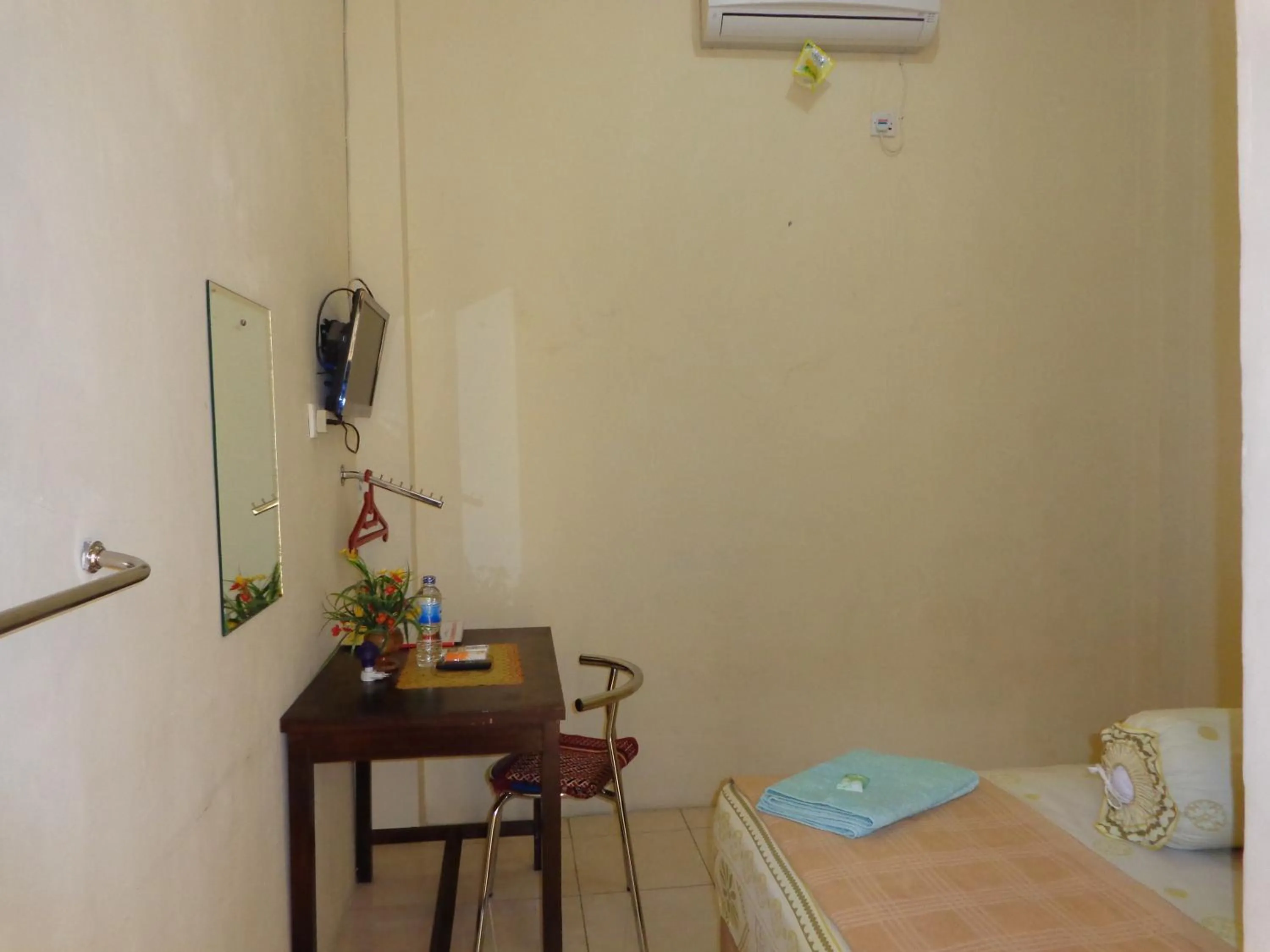 Bed in Hotel Musafir Inn