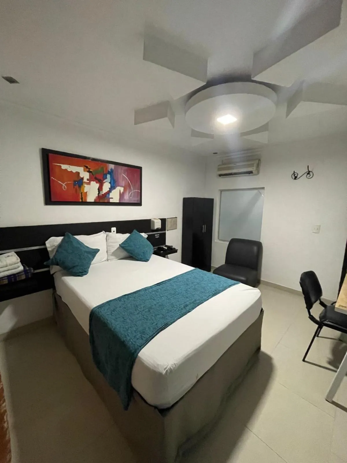 Photo of the whole room, Bed in Hotel Plaza Norte Cali