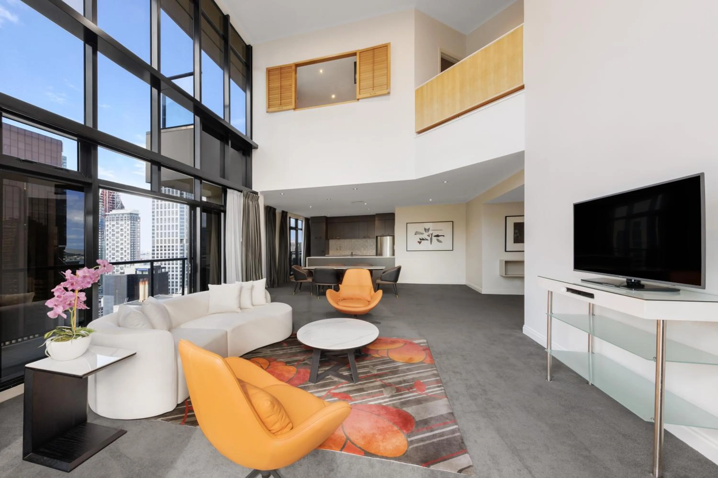 Communal lounge/ TV room in Adina Citylife Auckland