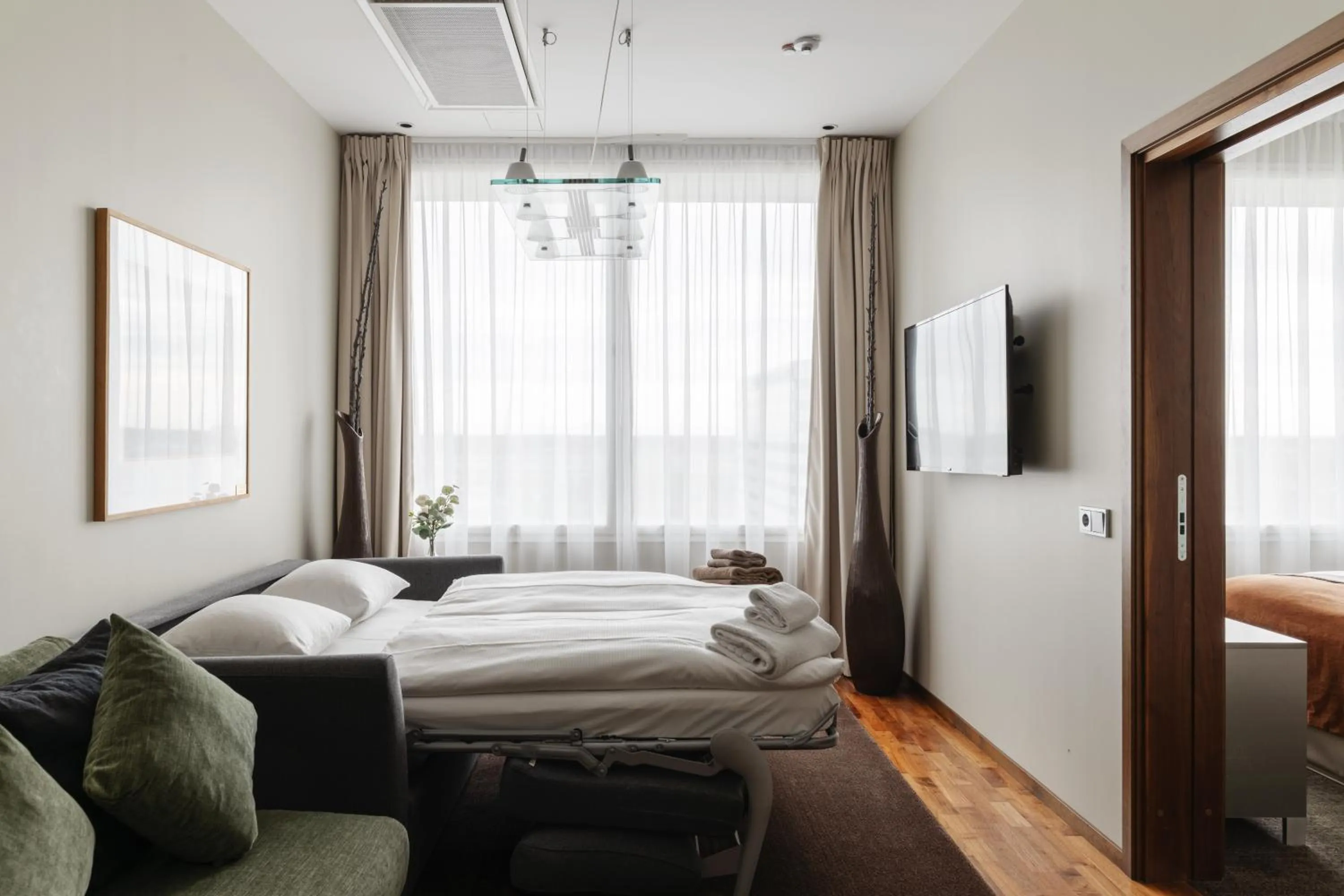 Living room, Bed in Clarion Hotel Arlanda Airport Terminal