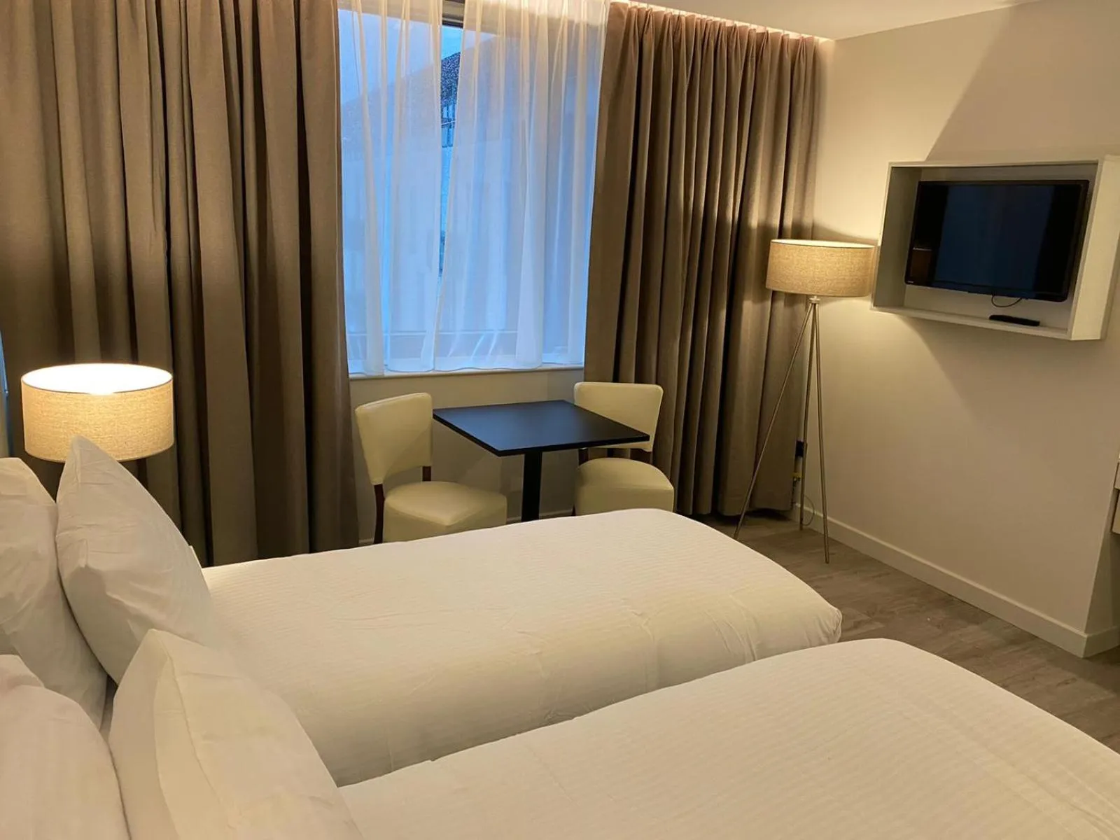 Bed in Axiom Park Hotel