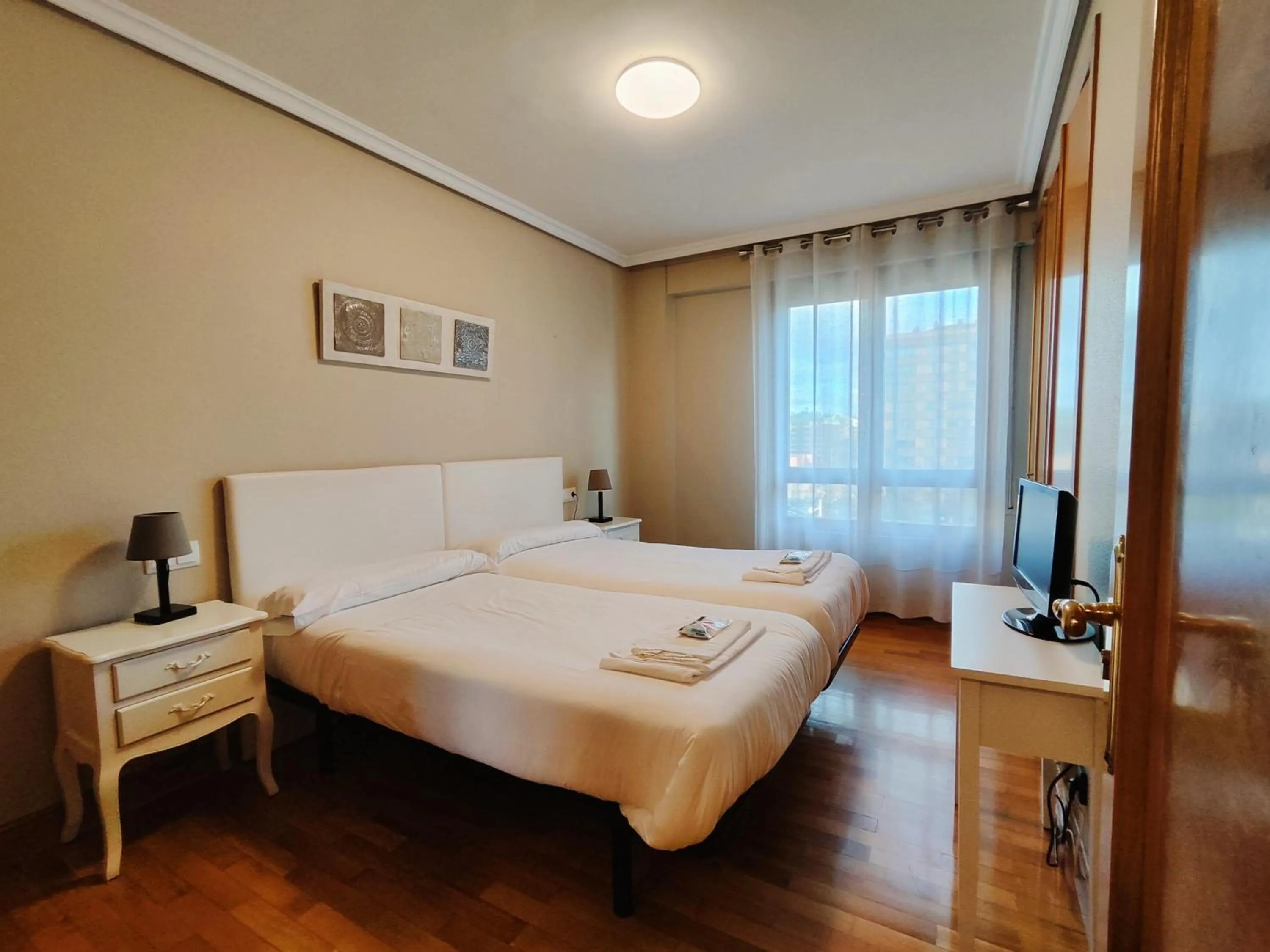 Bed in Gestión de Alojamientos Apartments