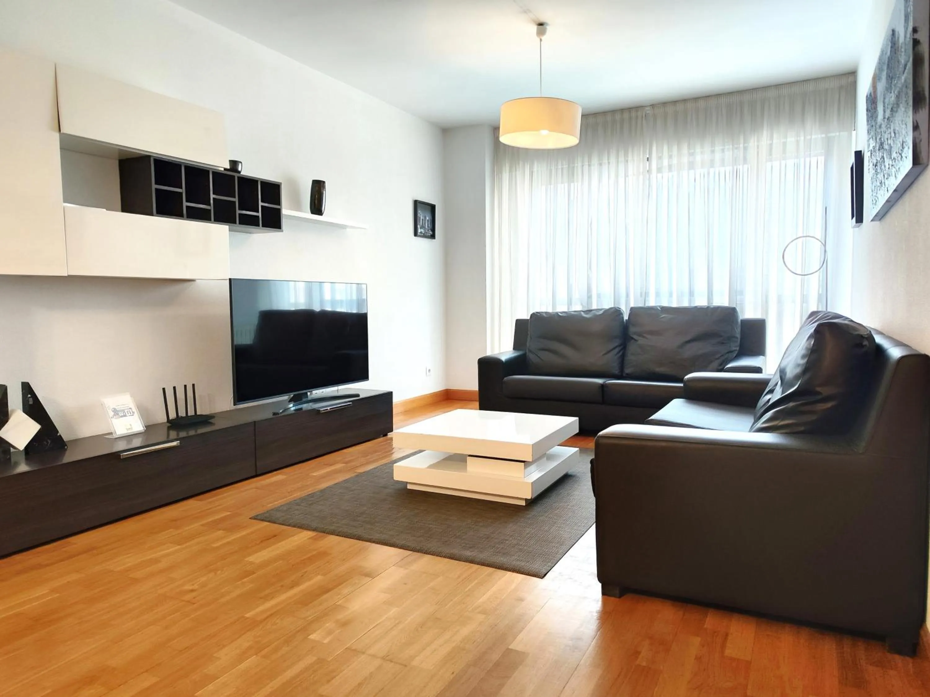 Communal lounge/ TV room in Gestión de Alojamientos Apartments