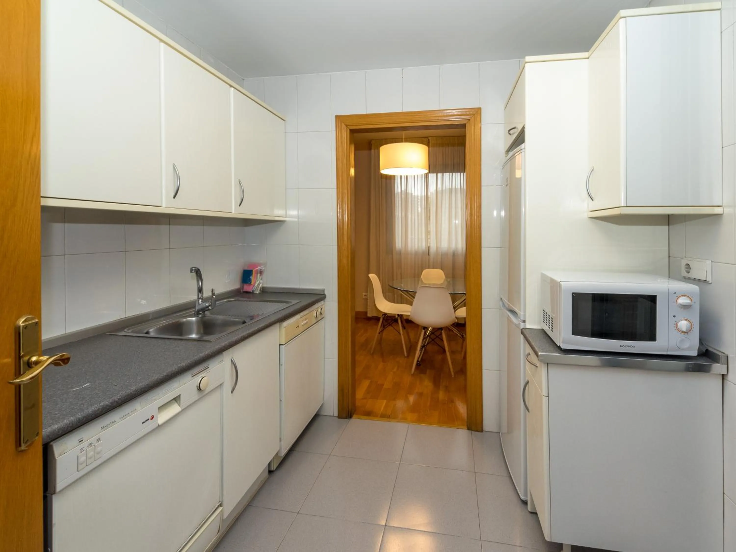 Kitchen or kitchenette in Gestión de Alojamientos Apartments