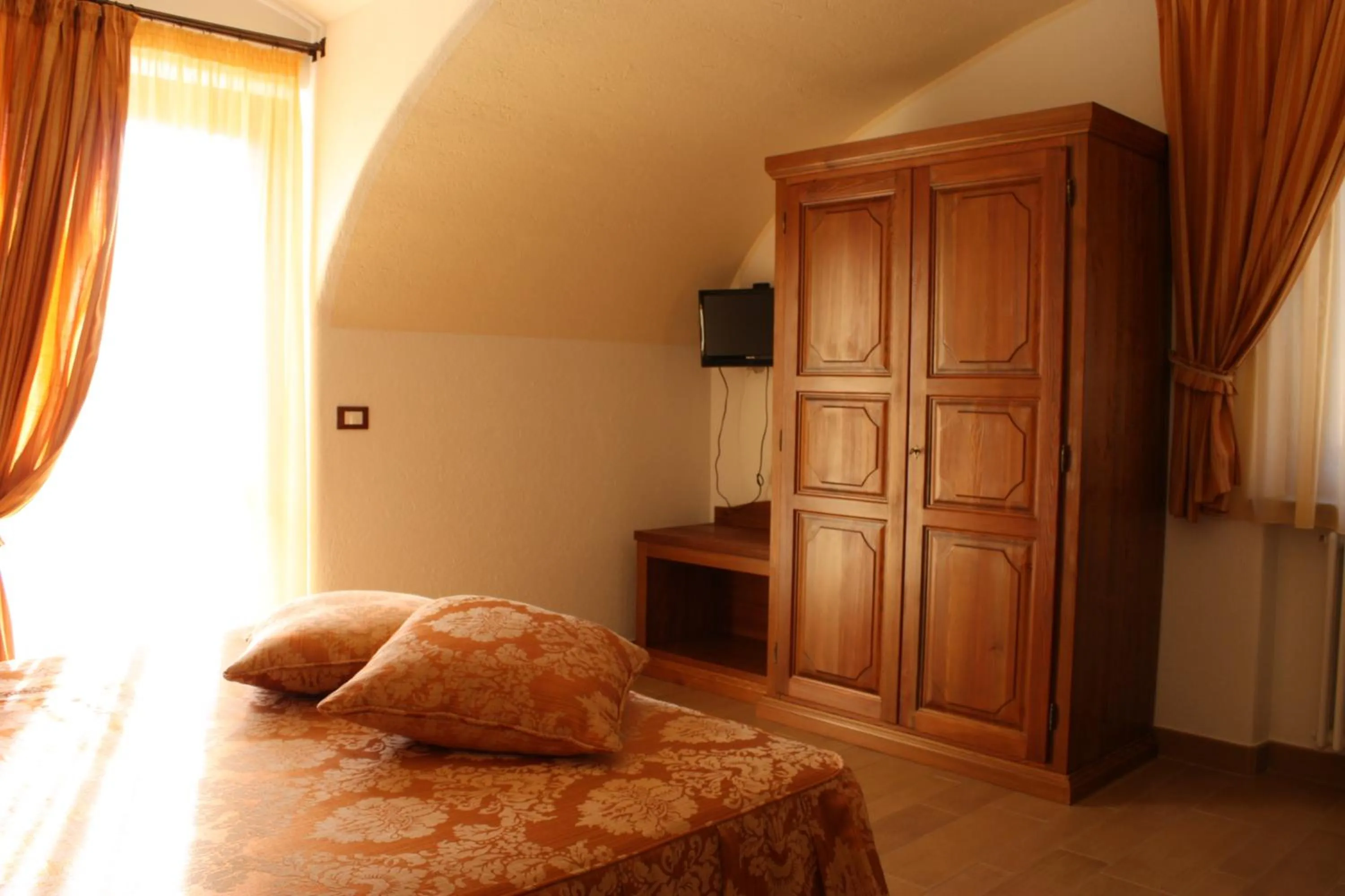 Decorative detail, Bed in Affittacamere Les Noyers