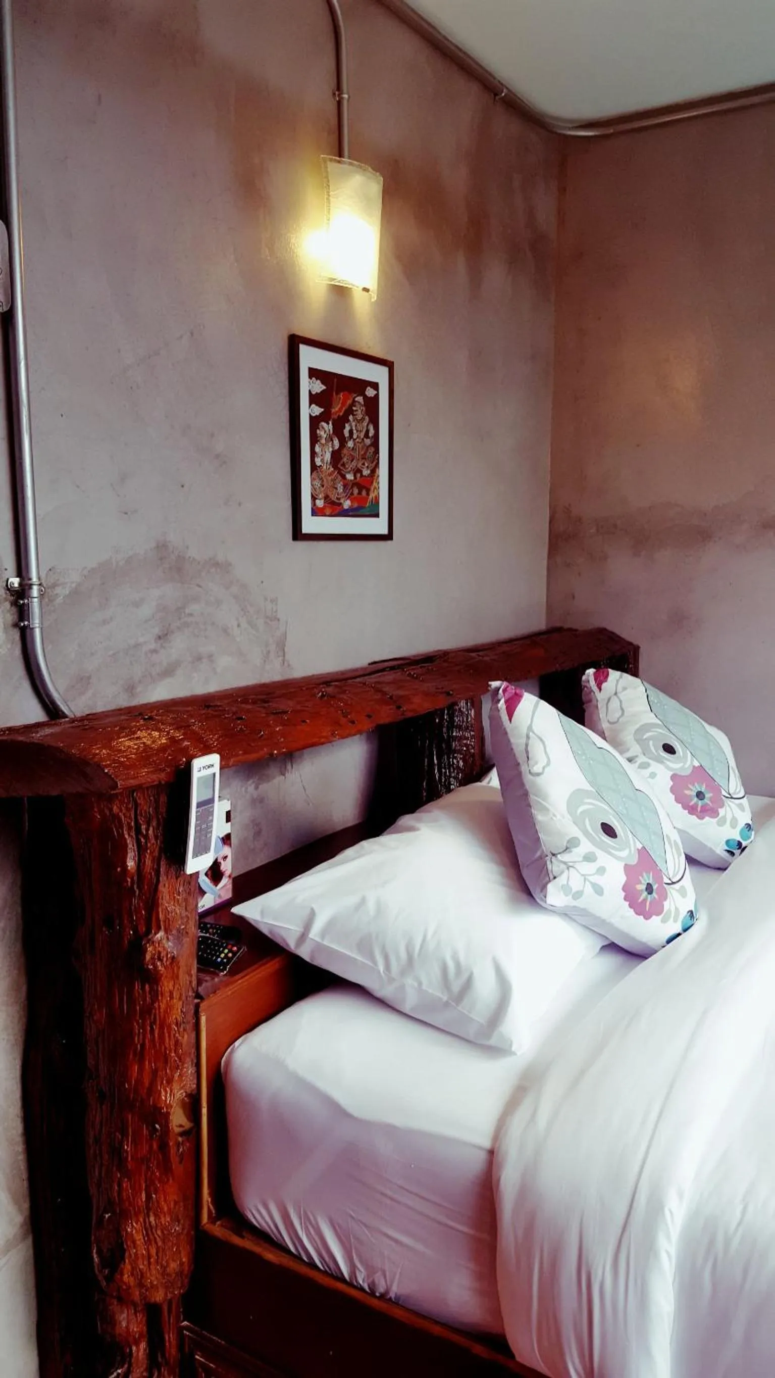 Bed in Baan Tubkaek Hotel