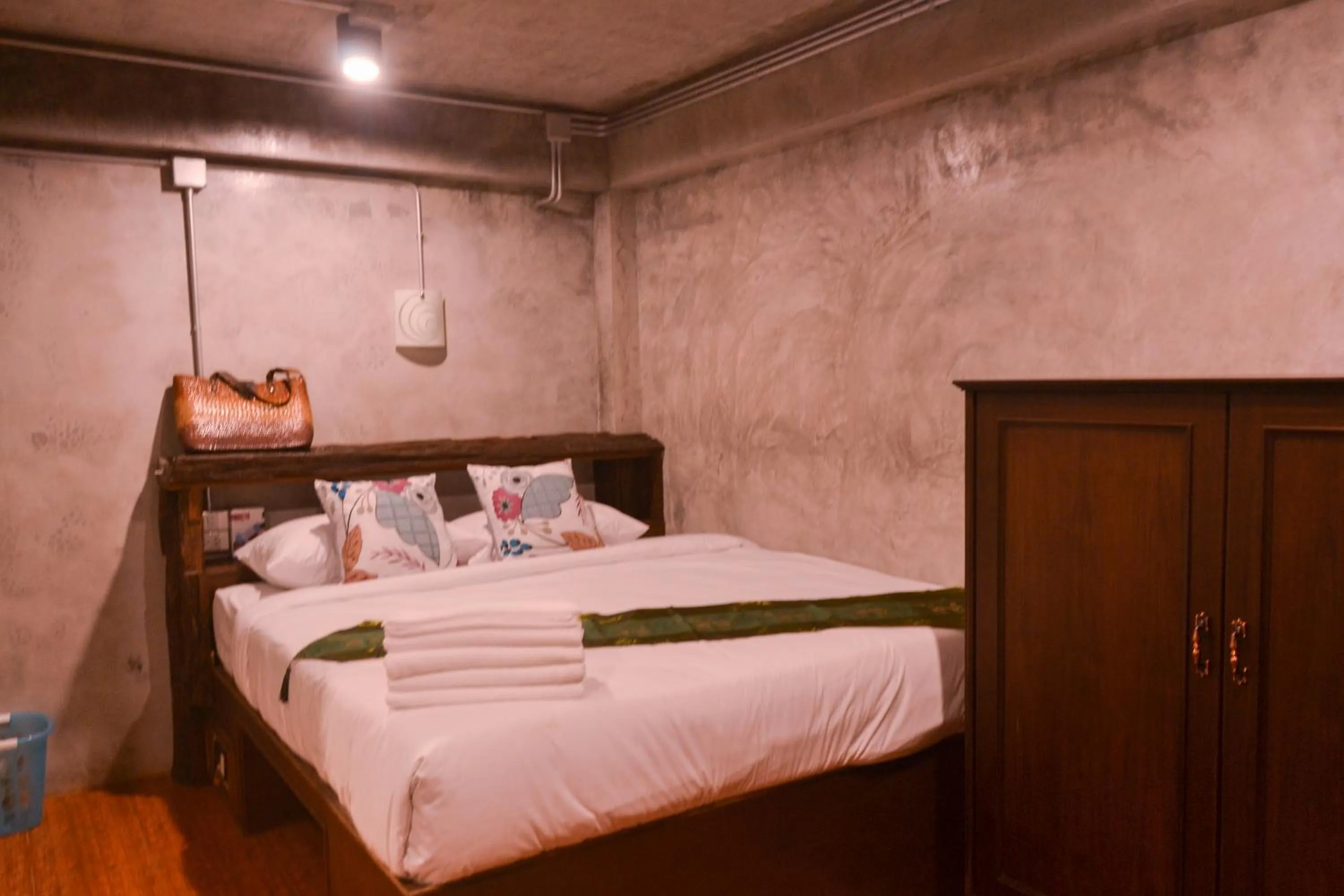 Bed in Baan Tubkaek Hotel