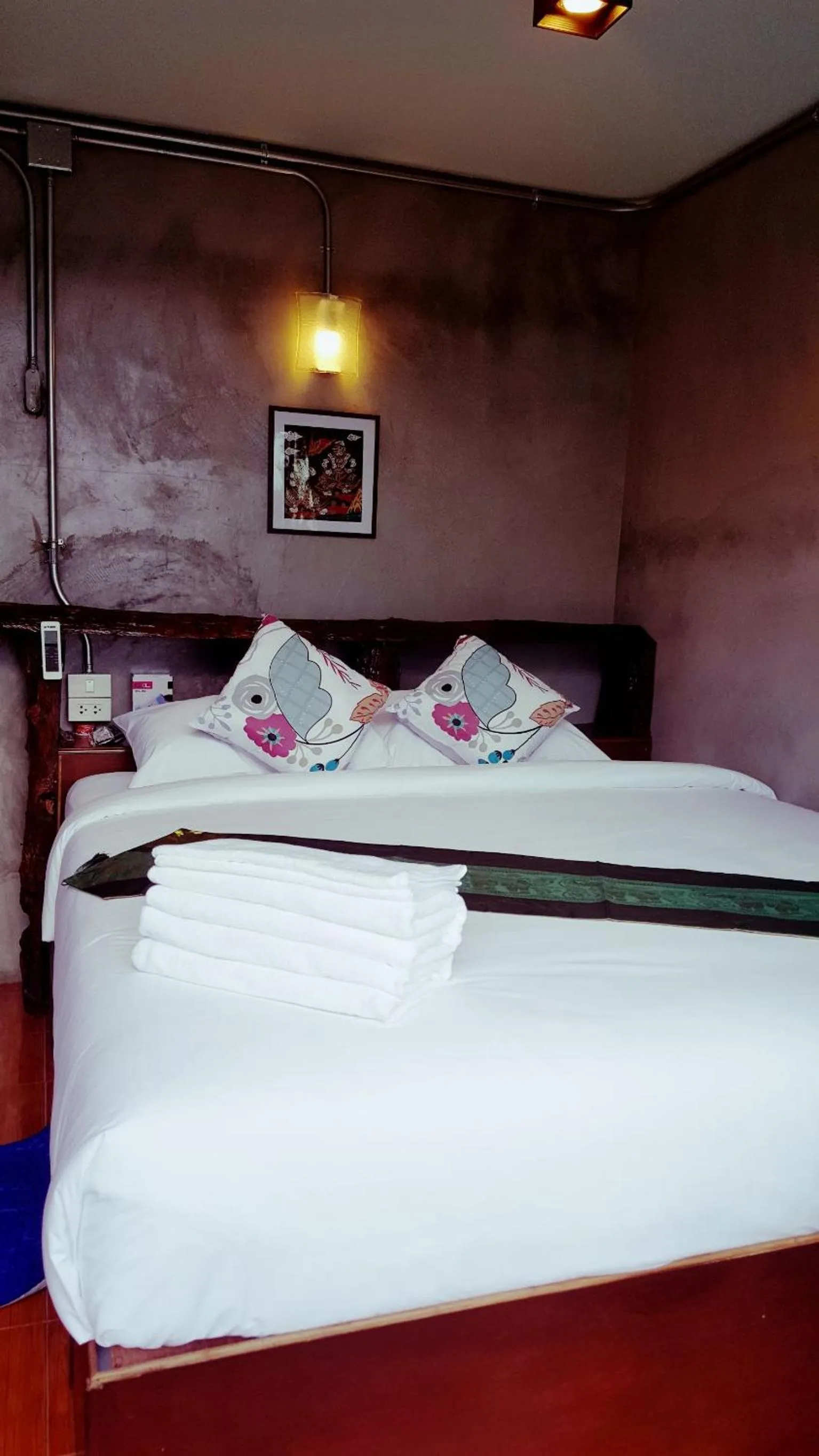 Bed in Baan Tubkaek Hotel