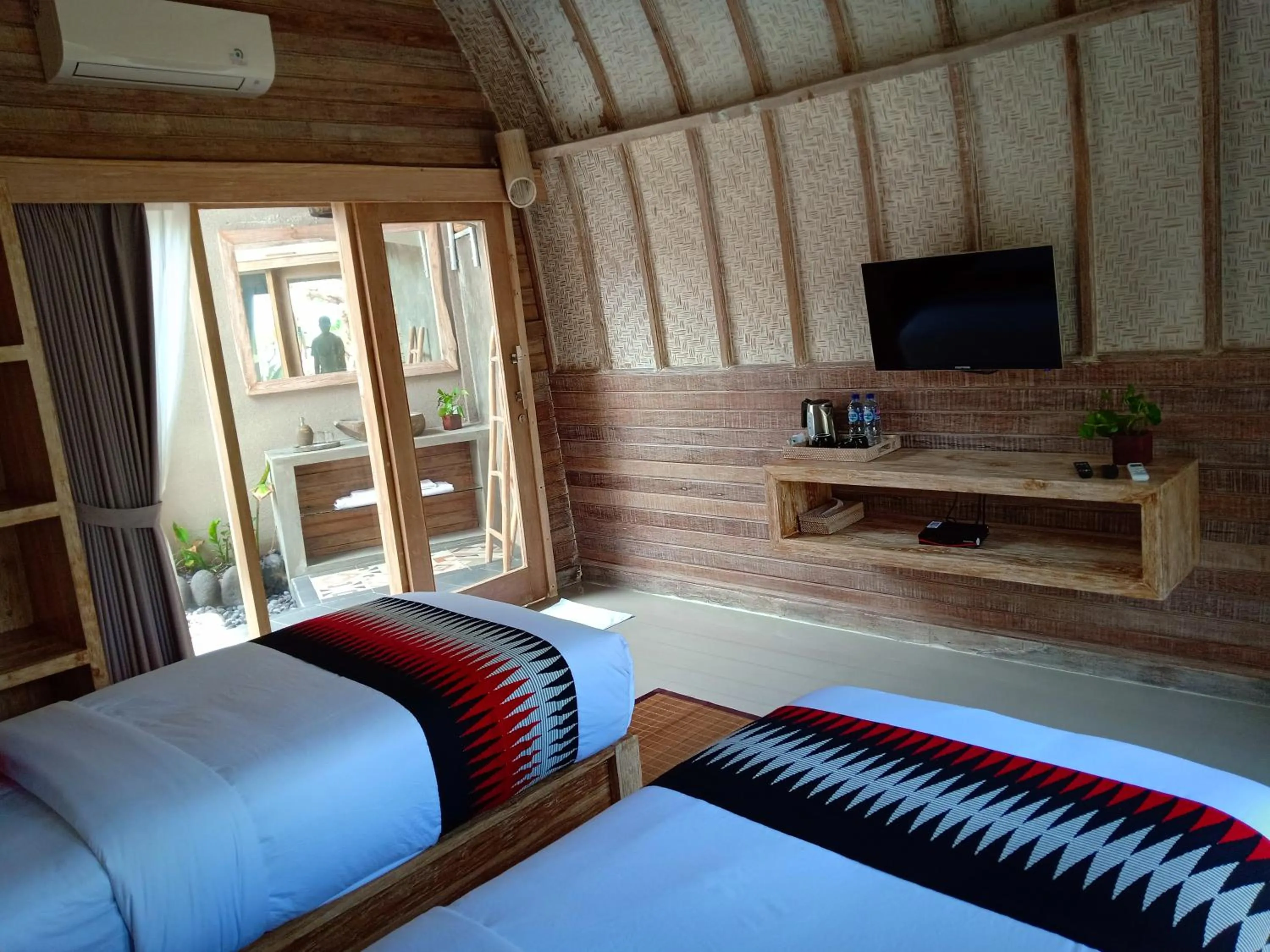 Bed in Kompyang Cottage