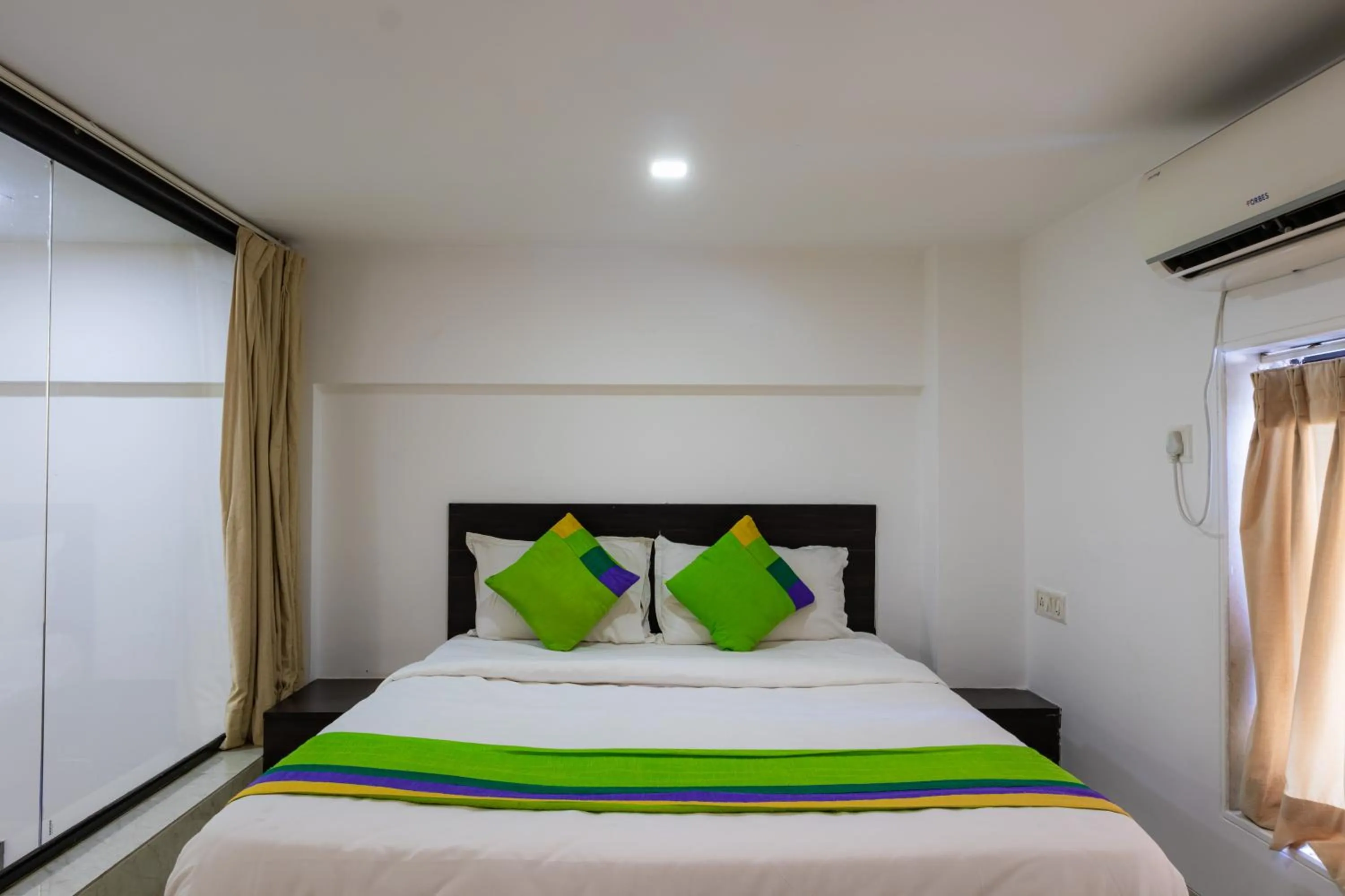 Bed in Treebo The Blue Roof