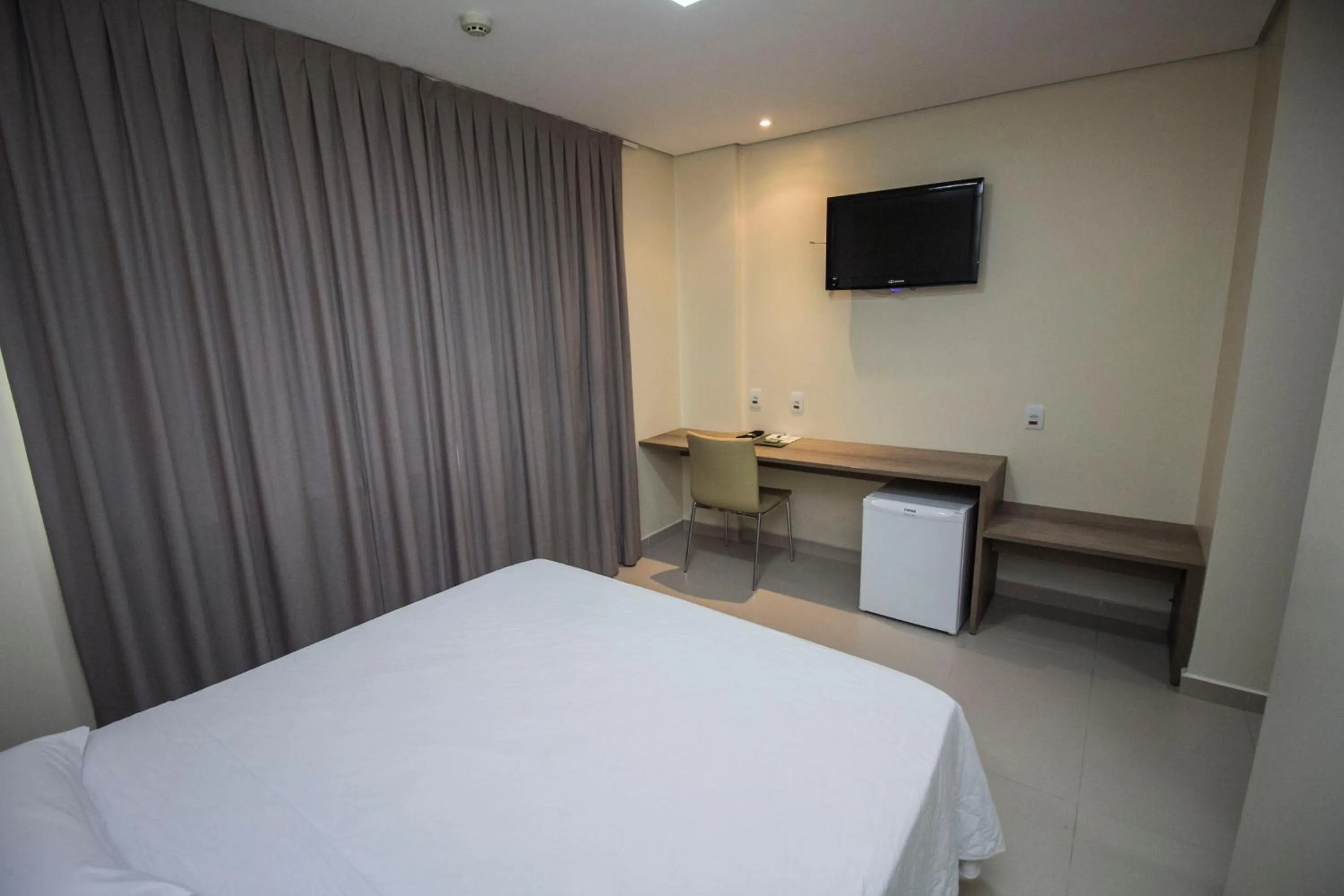 Bed in Golden Plaza Hotel