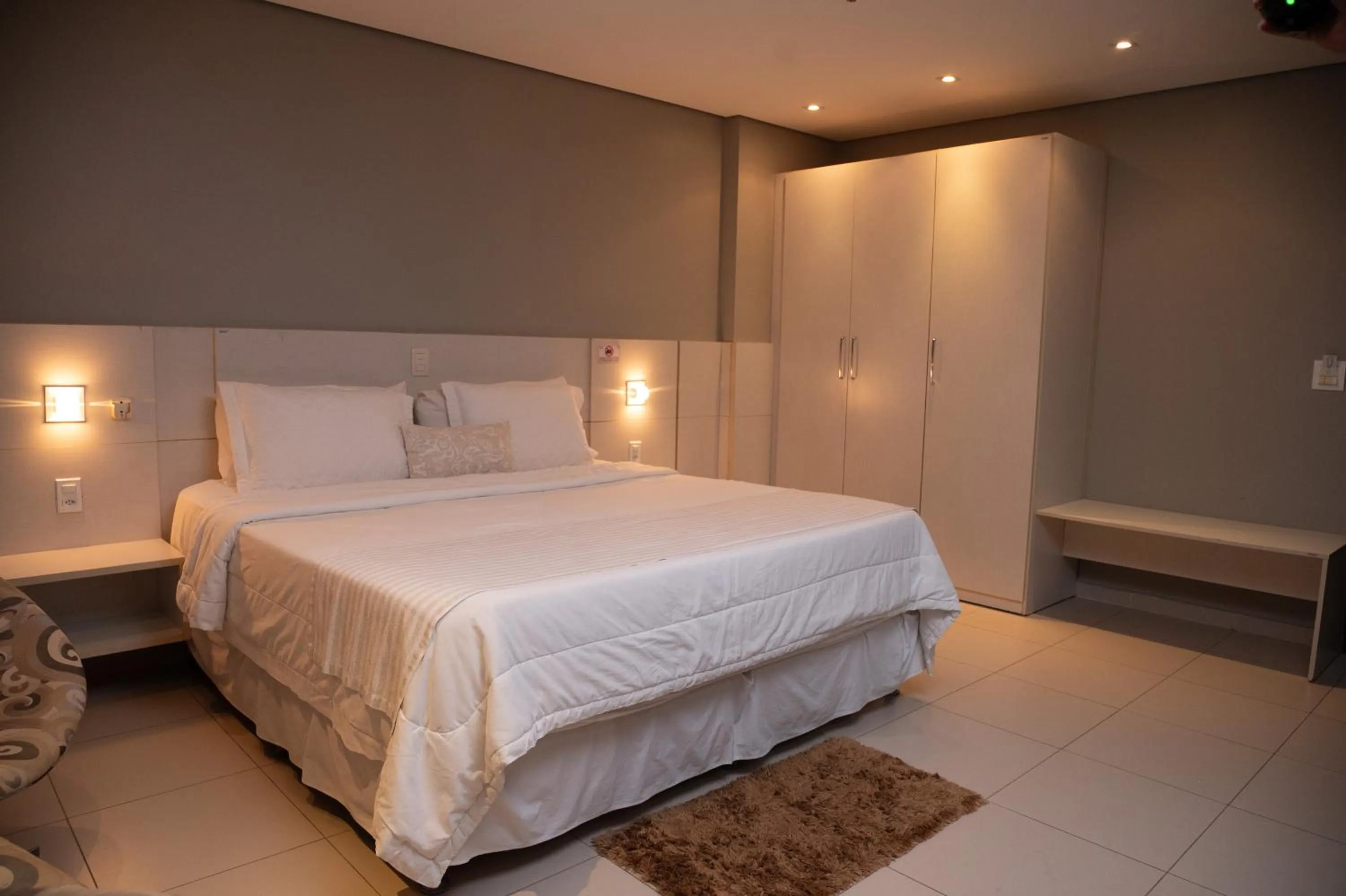 Bed in Golden Plaza Hotel