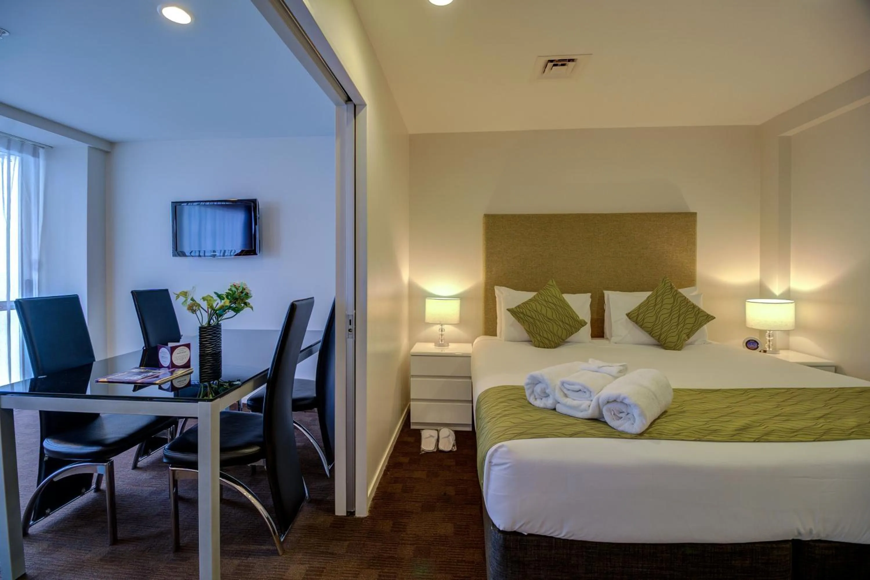 Bed in The Quadrant Hotel & Suites