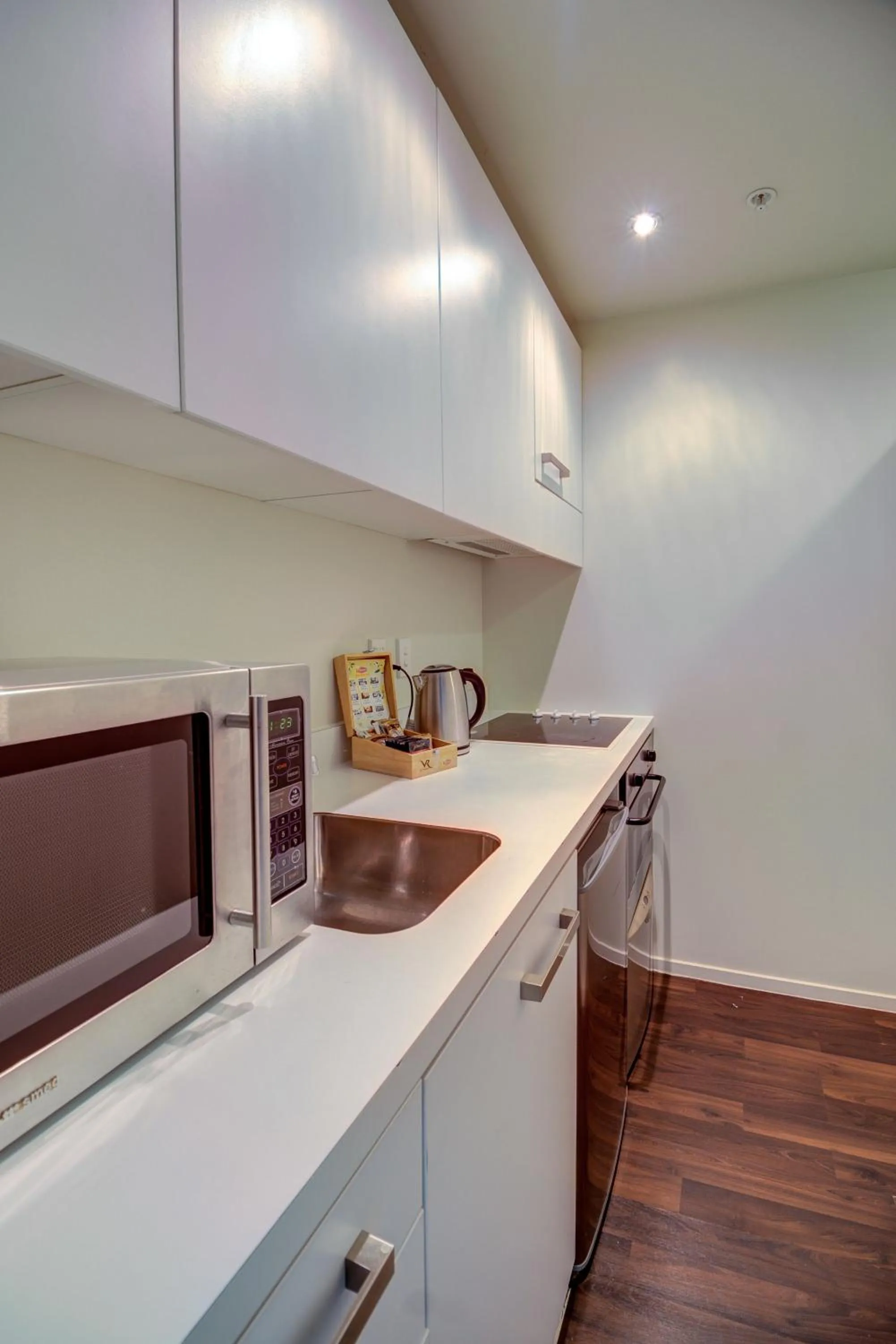 Kitchen or kitchenette in The Quadrant Hotel & Suites