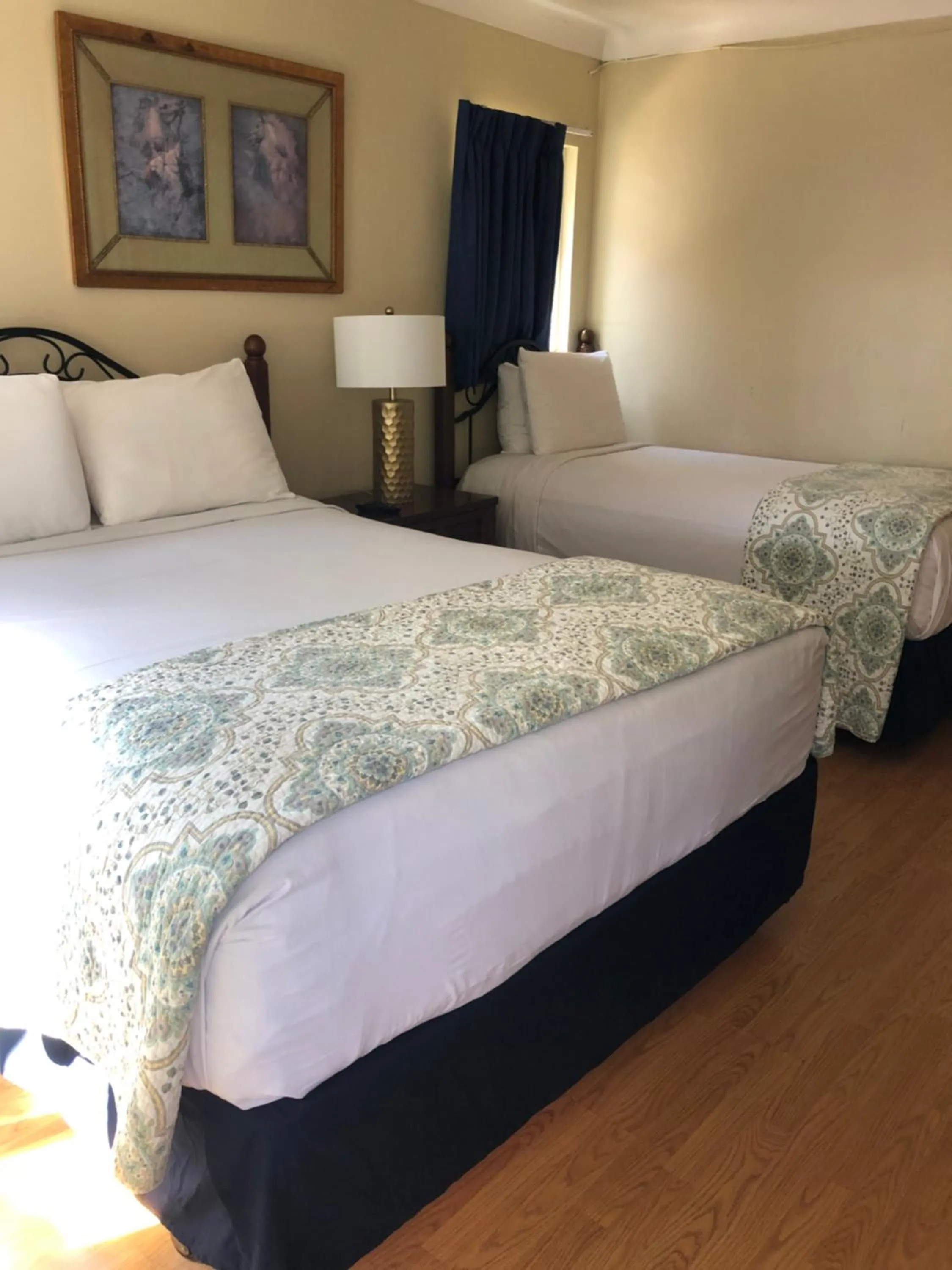 Bed in Rest Haven Motel