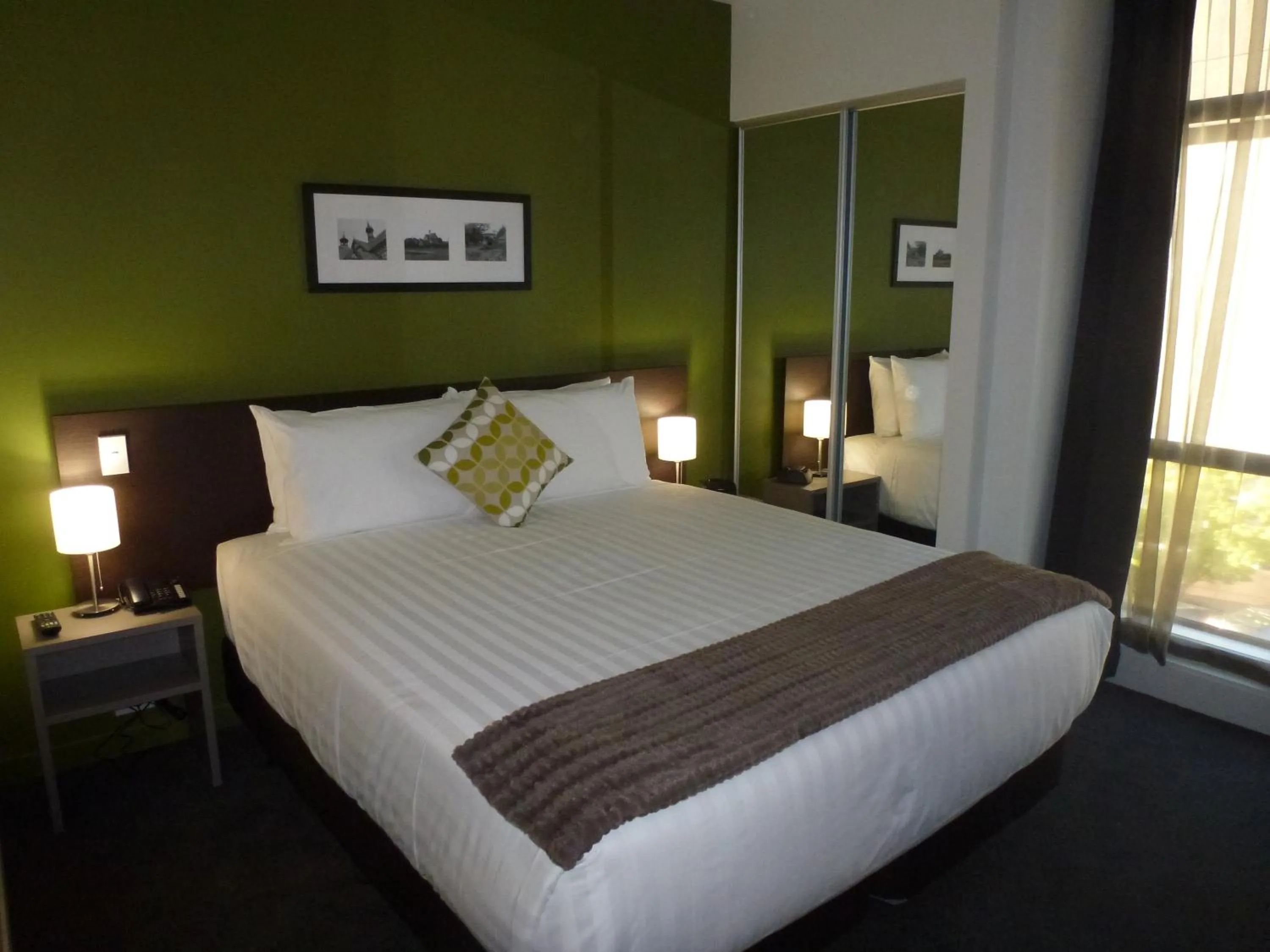 Bed in Quest Rotorua Central