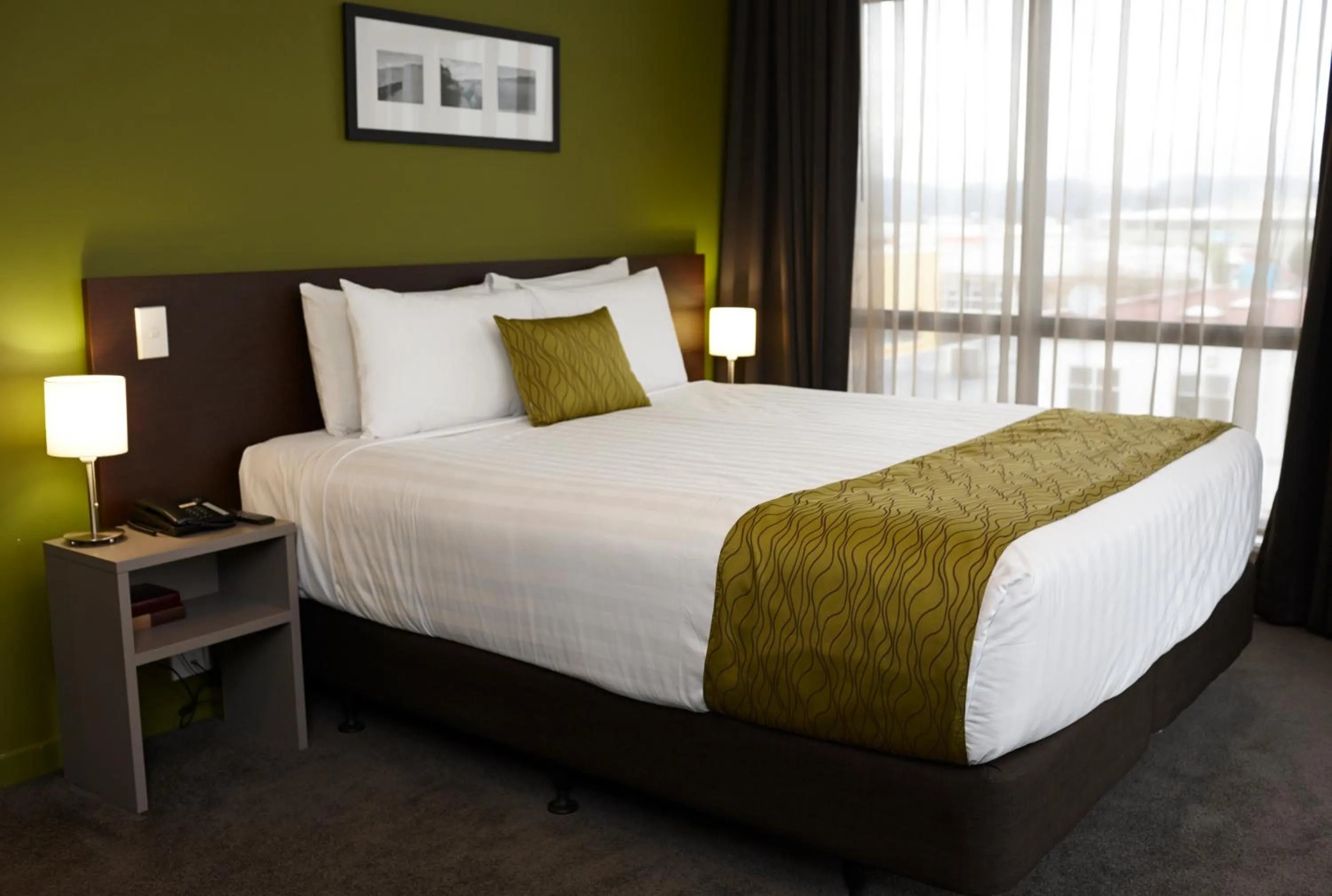 Bed in Quest Rotorua Central