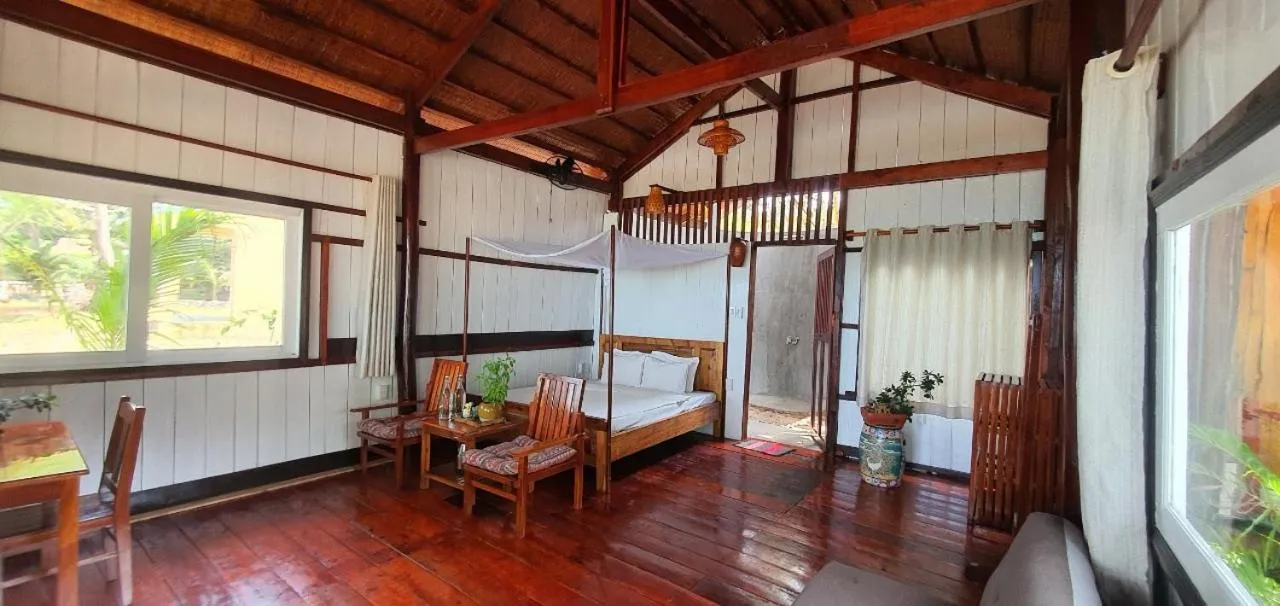 Bed in Bamboo Cottages