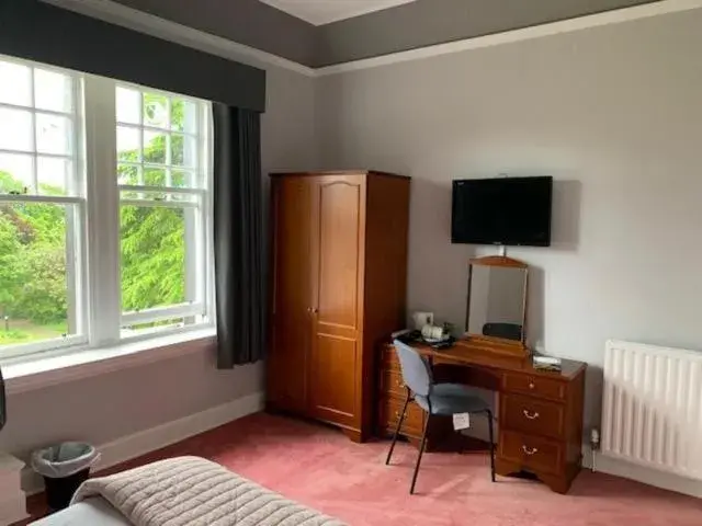 Compact Double Room in OYO Dunmar House Hotel Compact Double Room in OYO Dunmar House Hotel