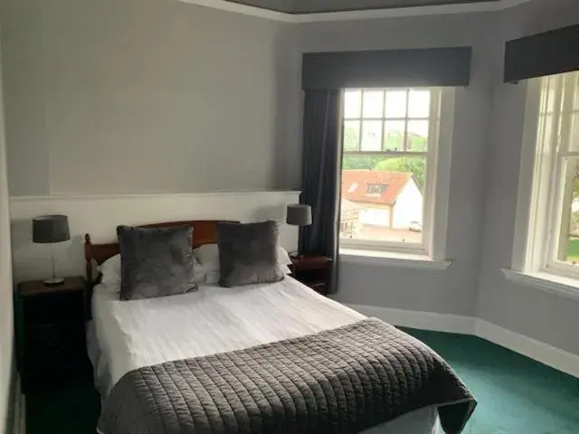 Standard Family of 3 Room in OYO Dunmar House Hotel Standard Family of 3 Room in OYO Dunmar House Hotel