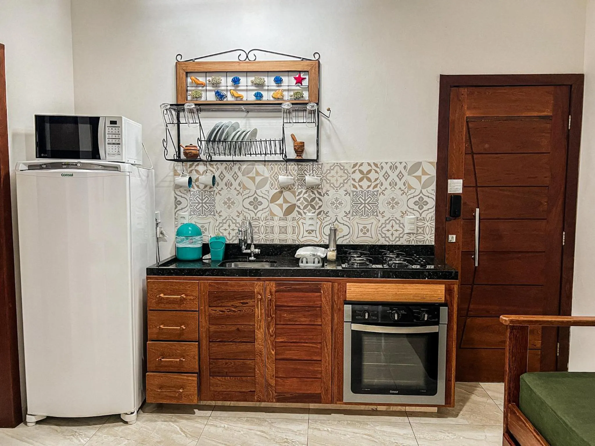 Kitchen or kitchenette in Conchas do Mar Residence