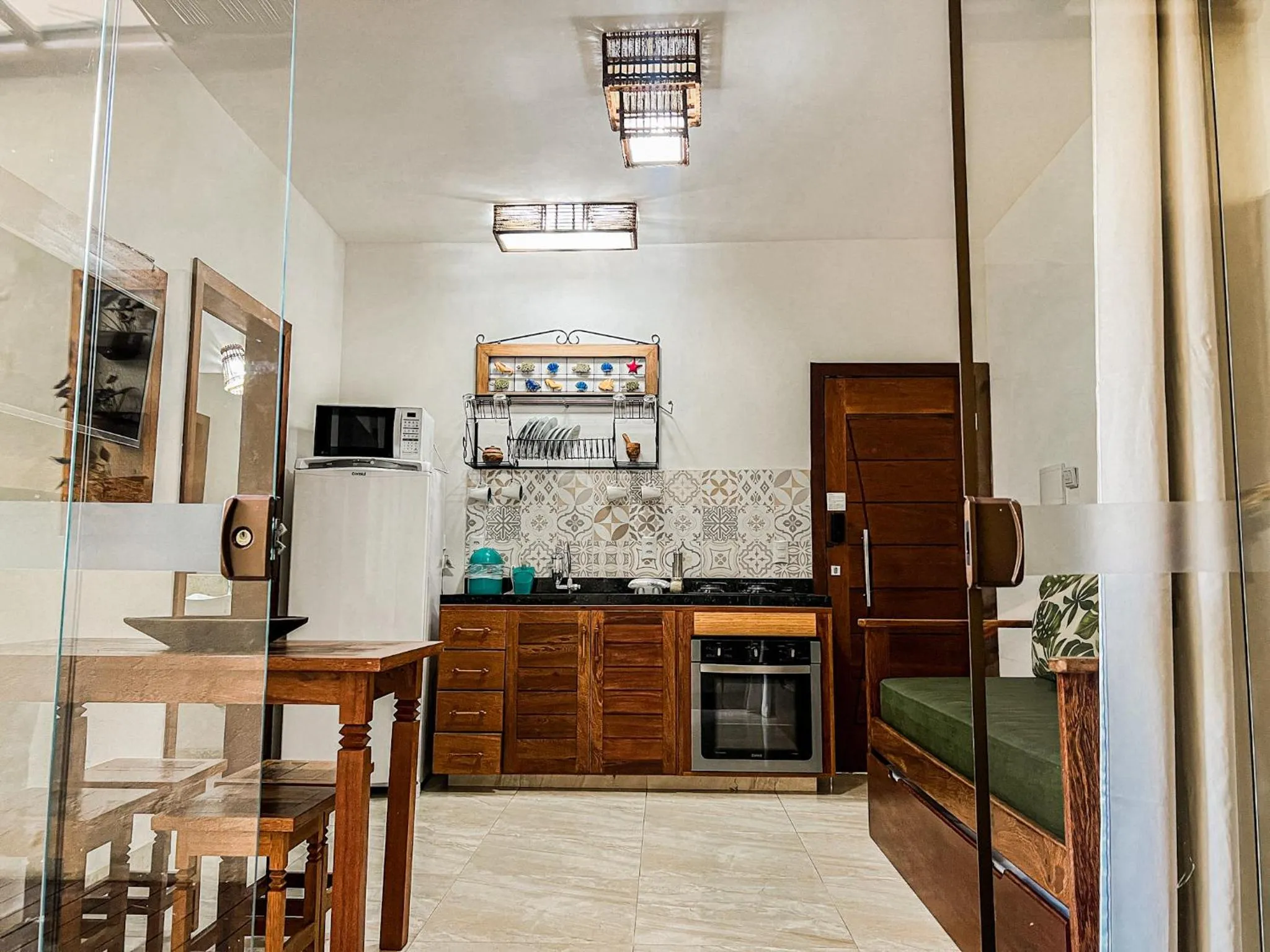 Kitchen or kitchenette in Conchas do Mar Residence