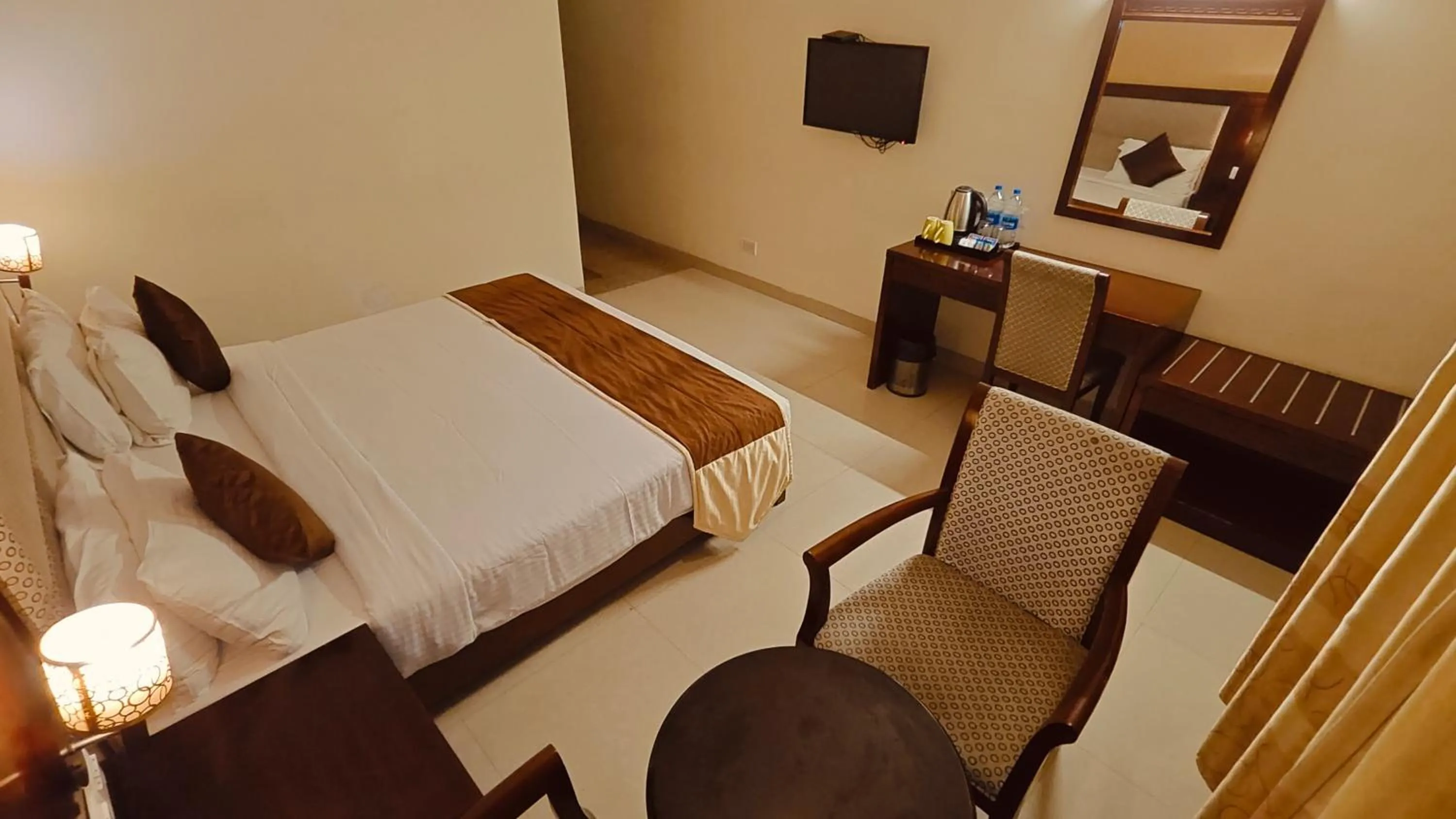 Bed in Alps Residency - A Bergamont Hotel, Krishnagiri
