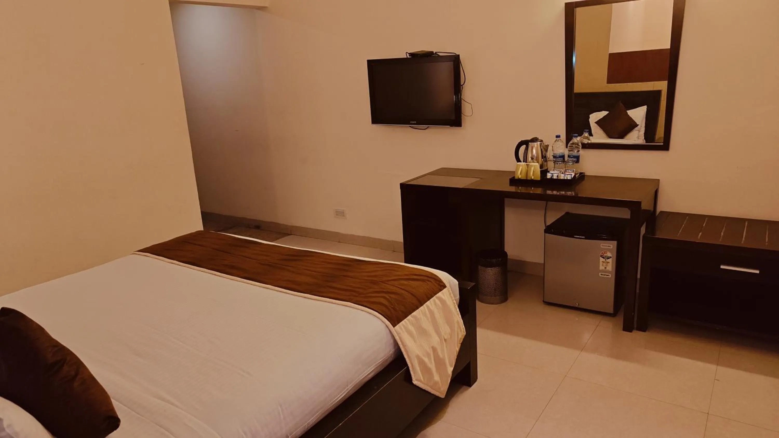 Bed in Alps Residency - A Bergamont Hotel, Krishnagiri