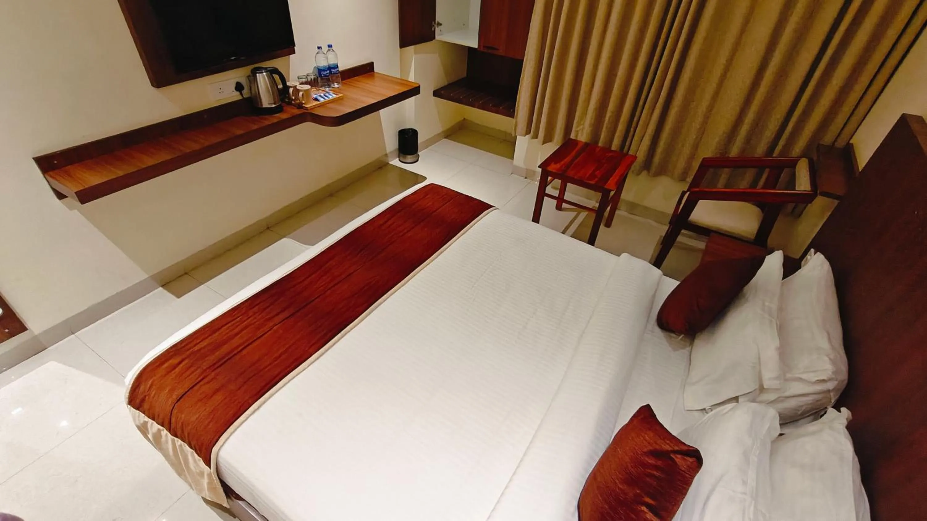 Bed in Alps Residency - A Bergamont Hotel, Krishnagiri