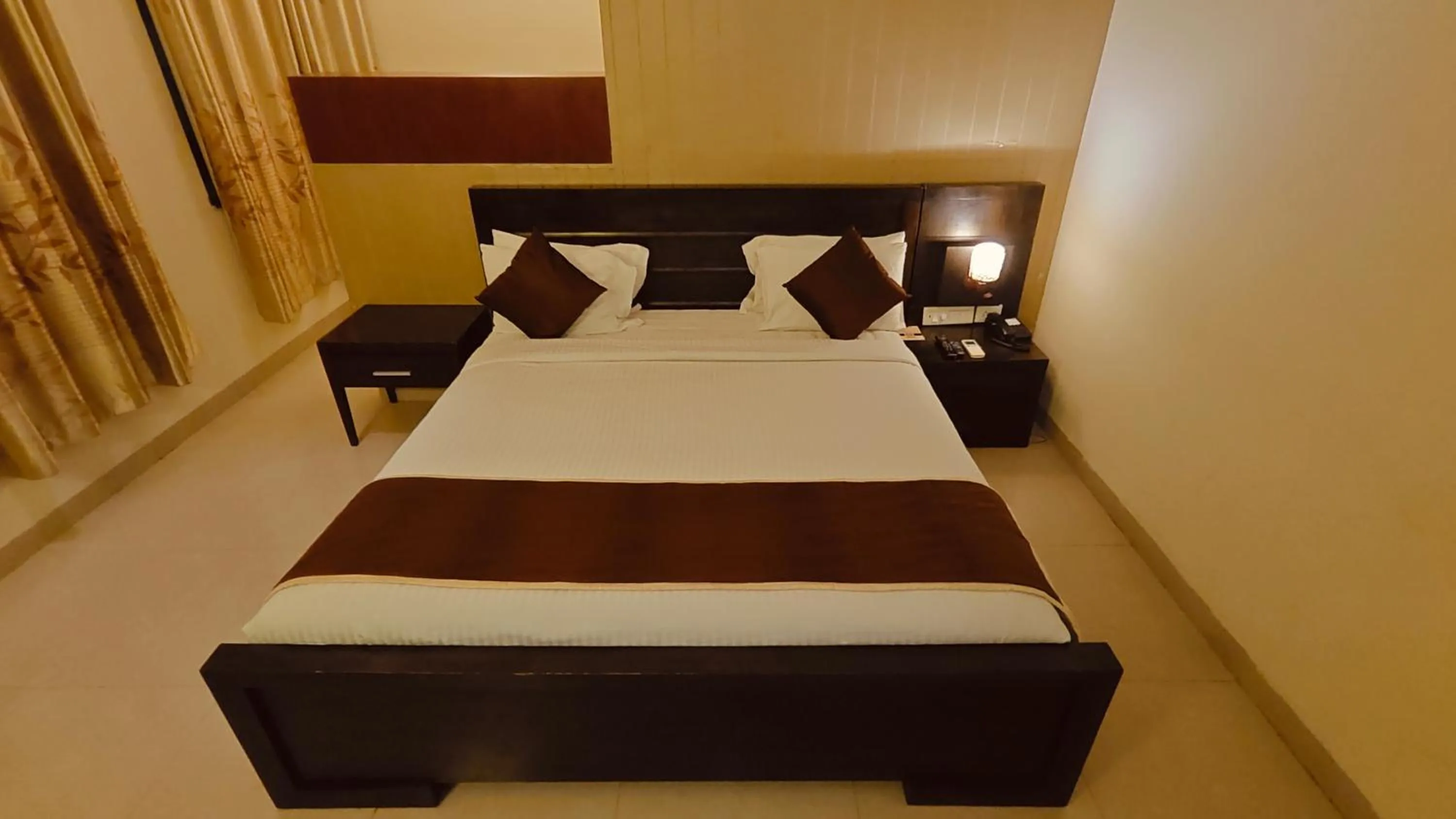 Bed in Alps Residency - A Bergamont Hotel, Krishnagiri