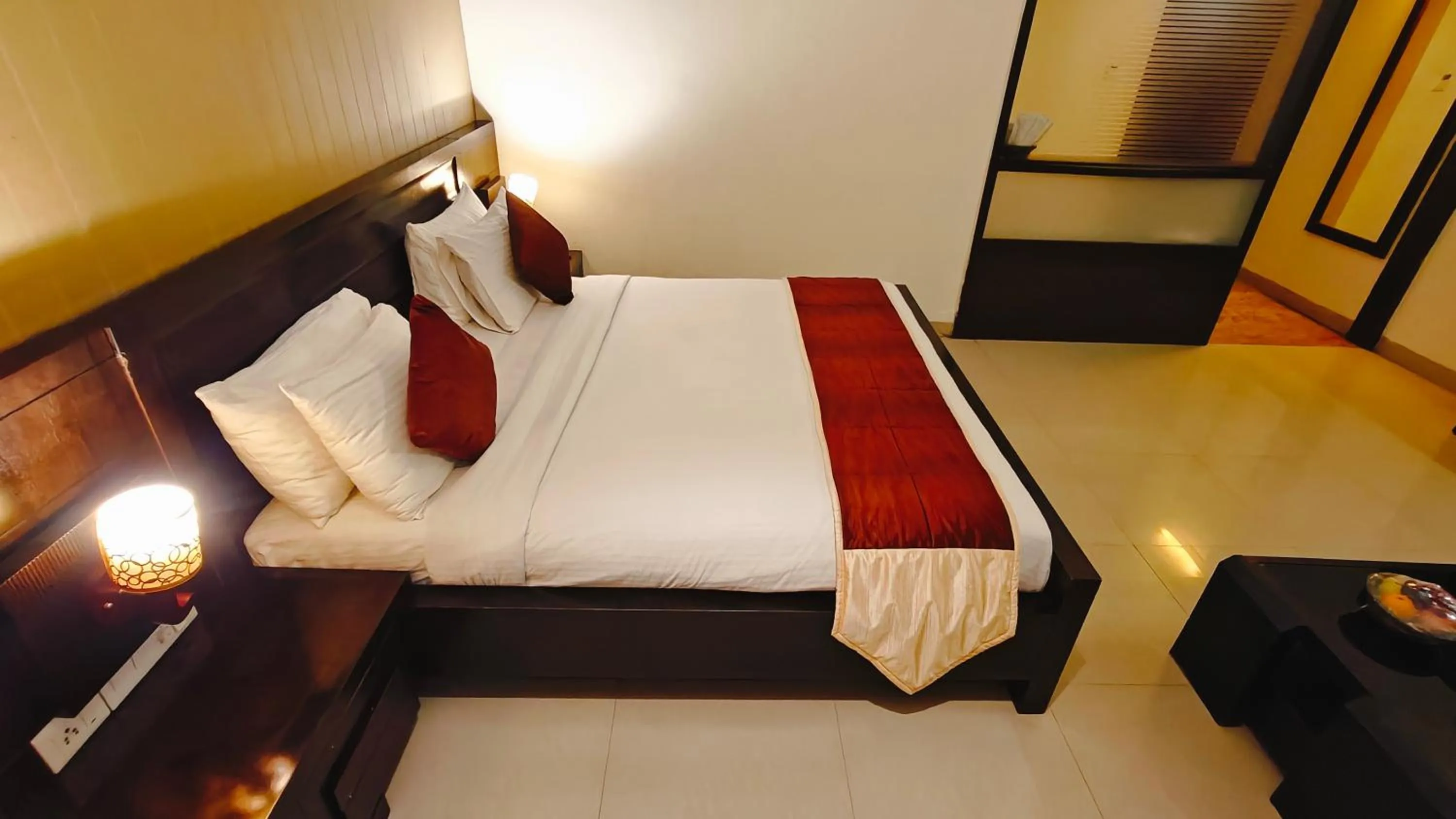 Bed in Alps Residency - A Bergamont Hotel, Krishnagiri